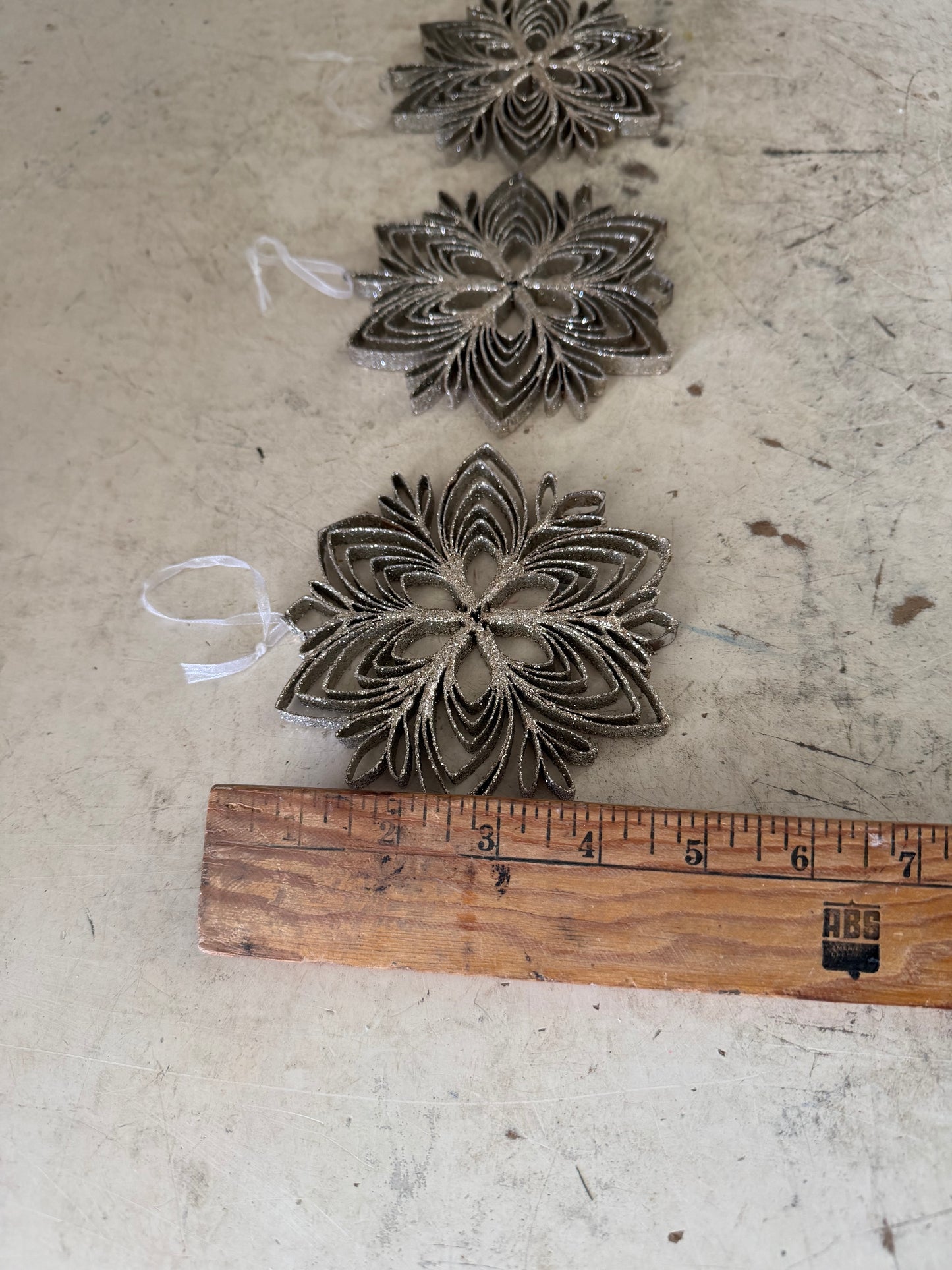 Set of metal glitter, snowflake ornaments