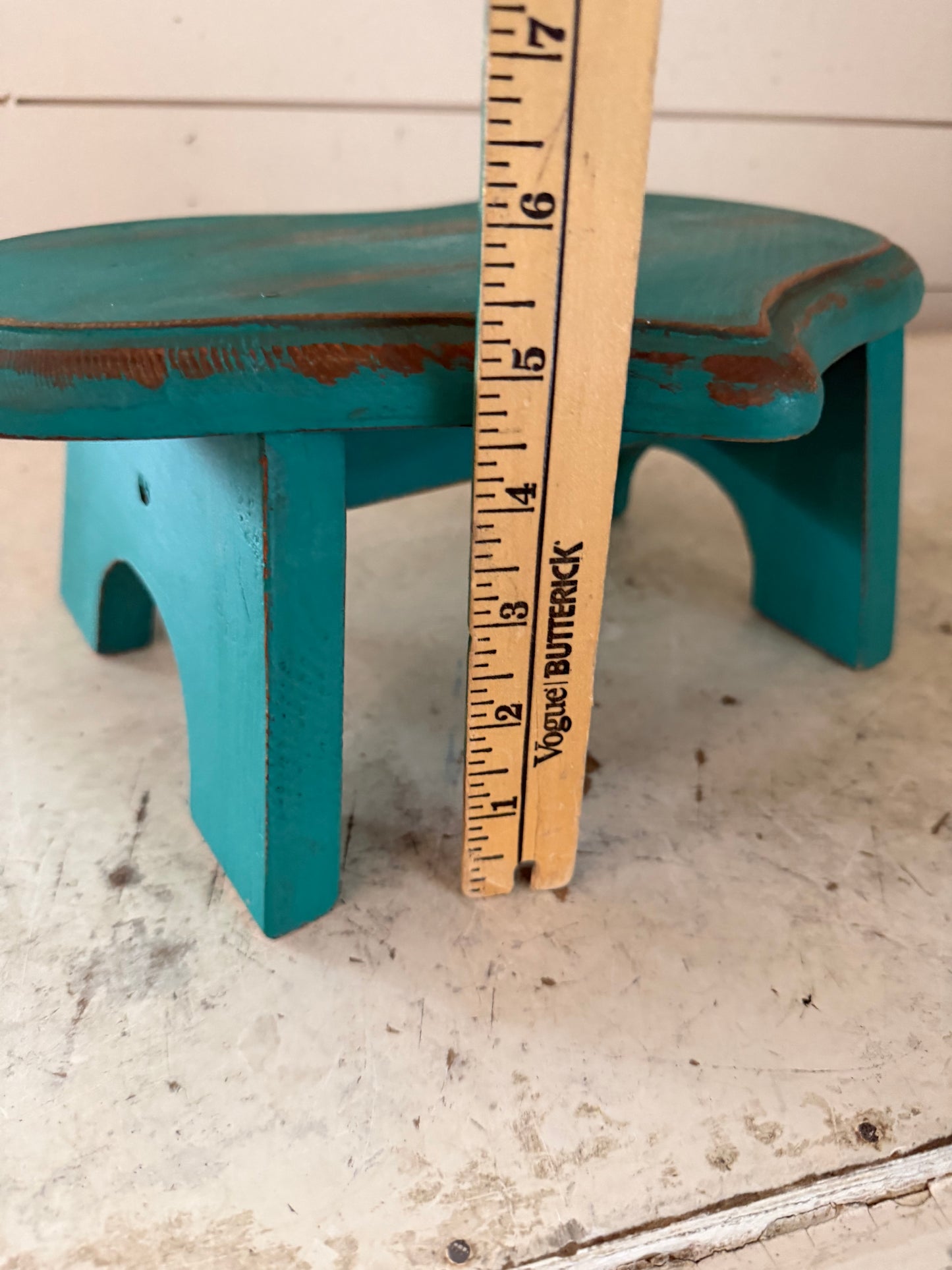 Wood heart-shaped stool painted turquoise