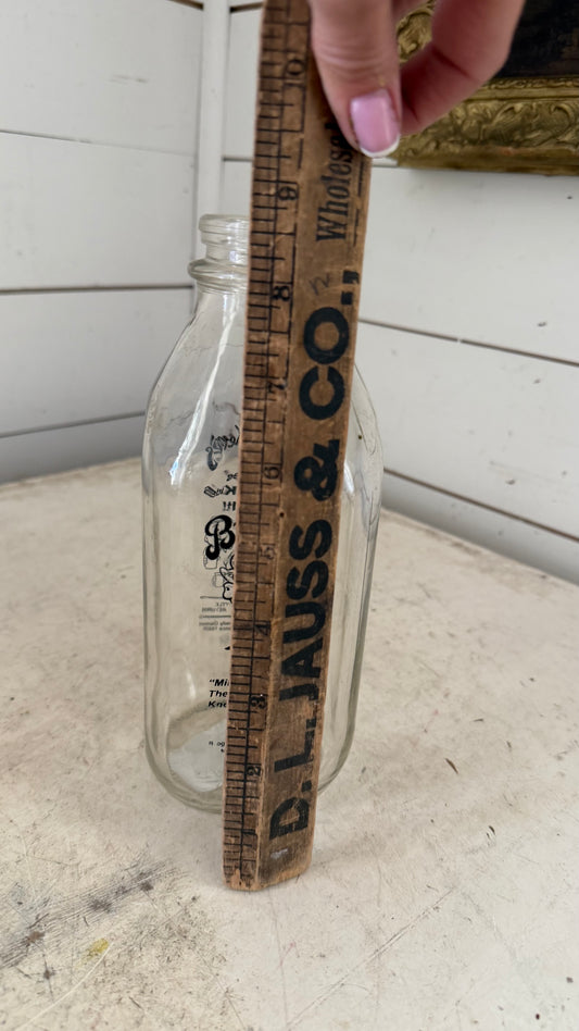 Vintage glass 1-quart milk bottle is from Broguiere's Farm Fresh Dairy