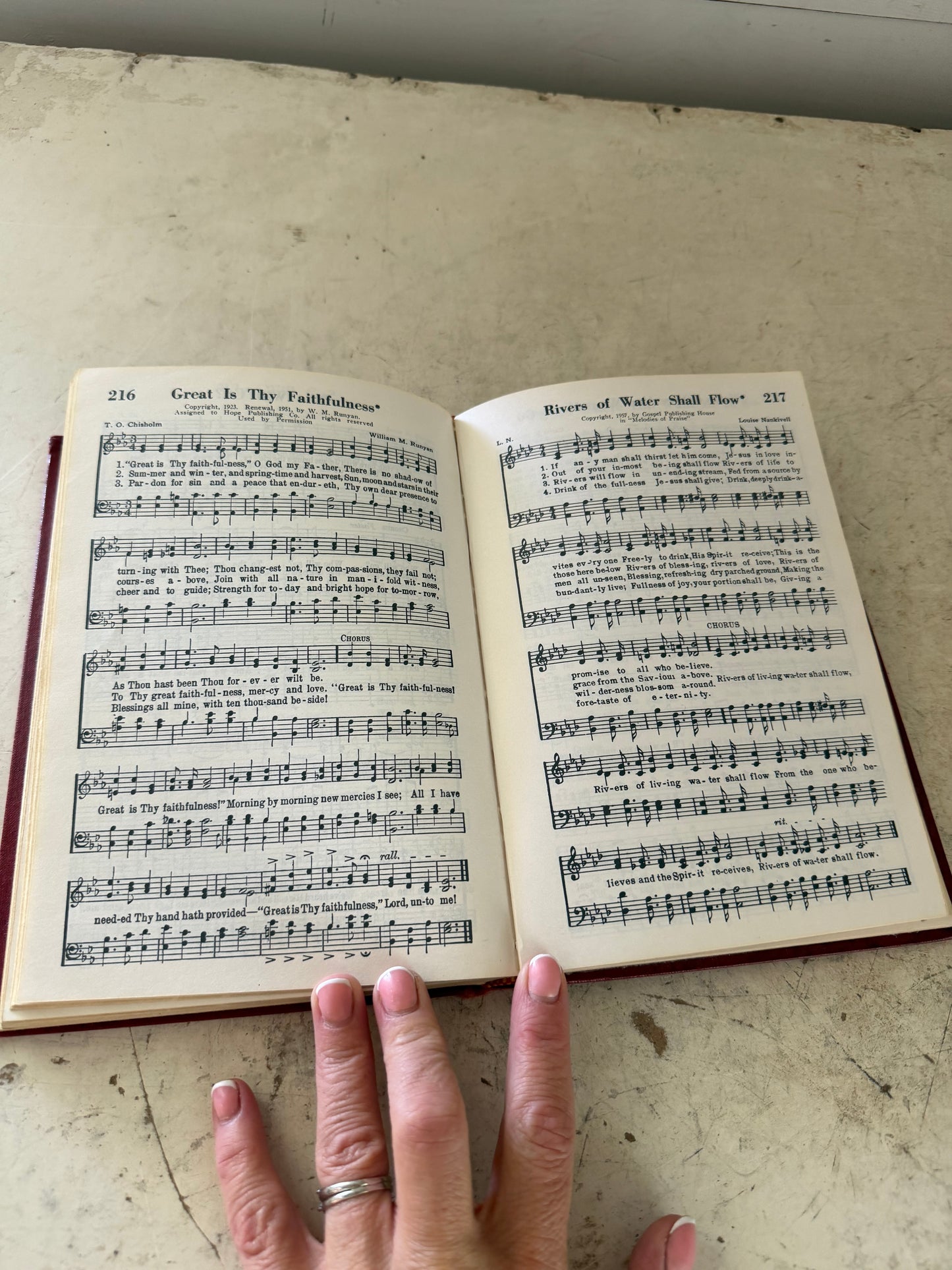1957 edition of the "Melodies of Praise" church hymnal published by the Gospel Publishing House.