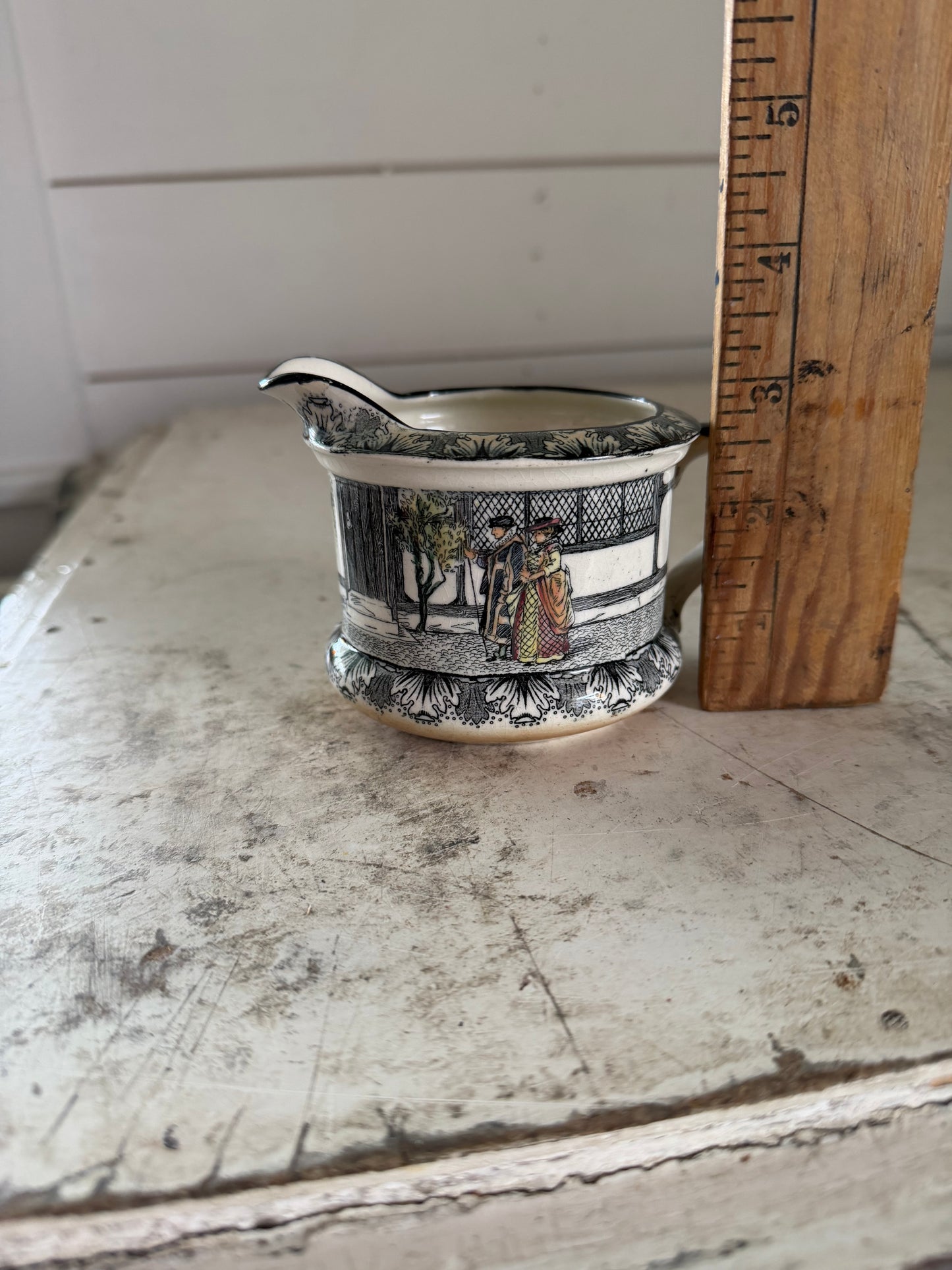 Antique Royal Doulton creamer from the "Old Moreton Hall" series.