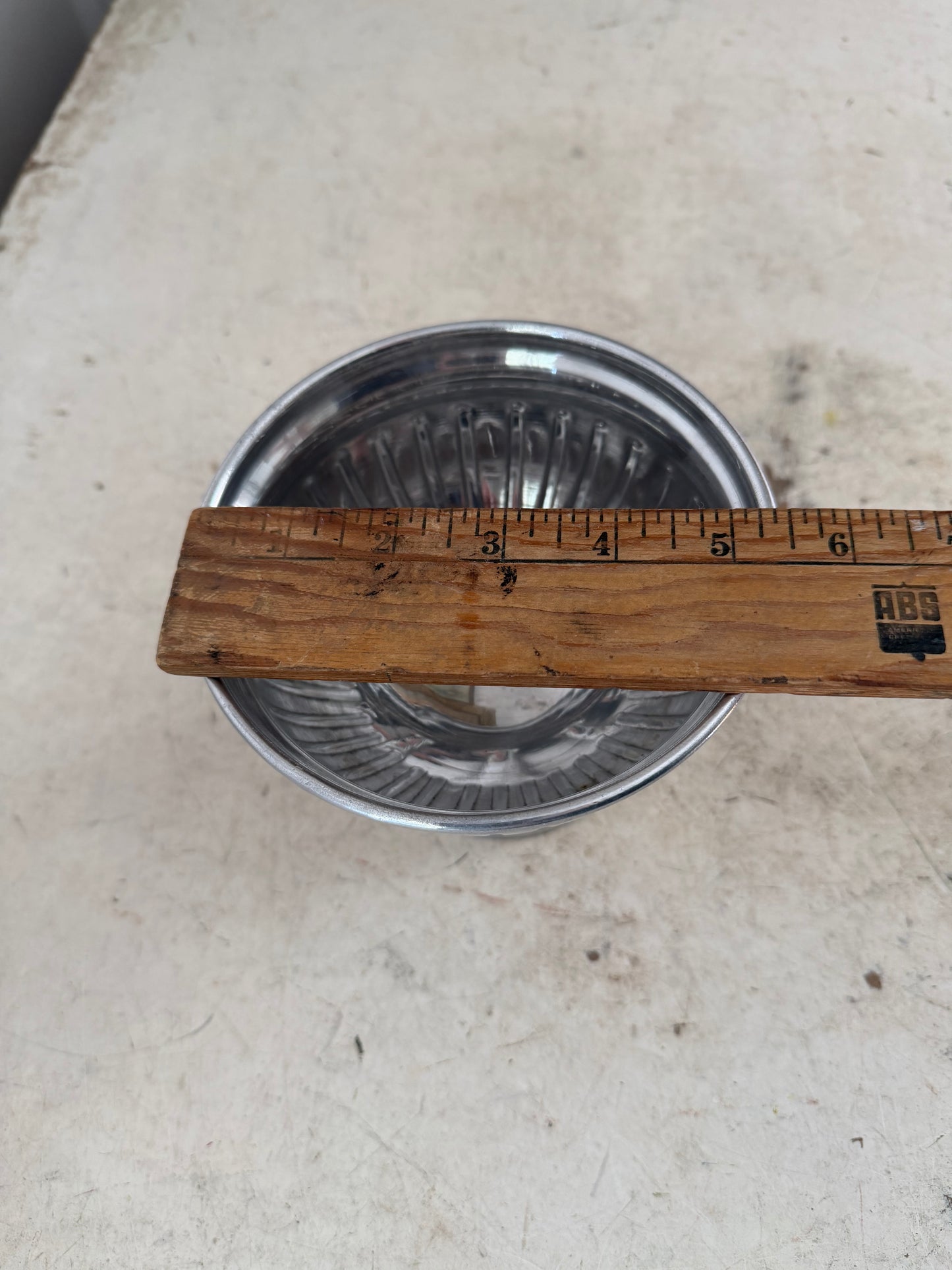 Metal pedestal bowl