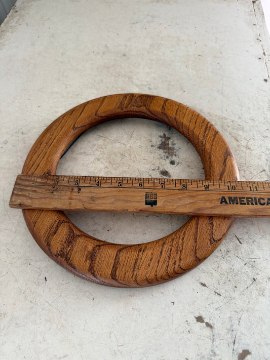 Round wood frame will get makeover and art