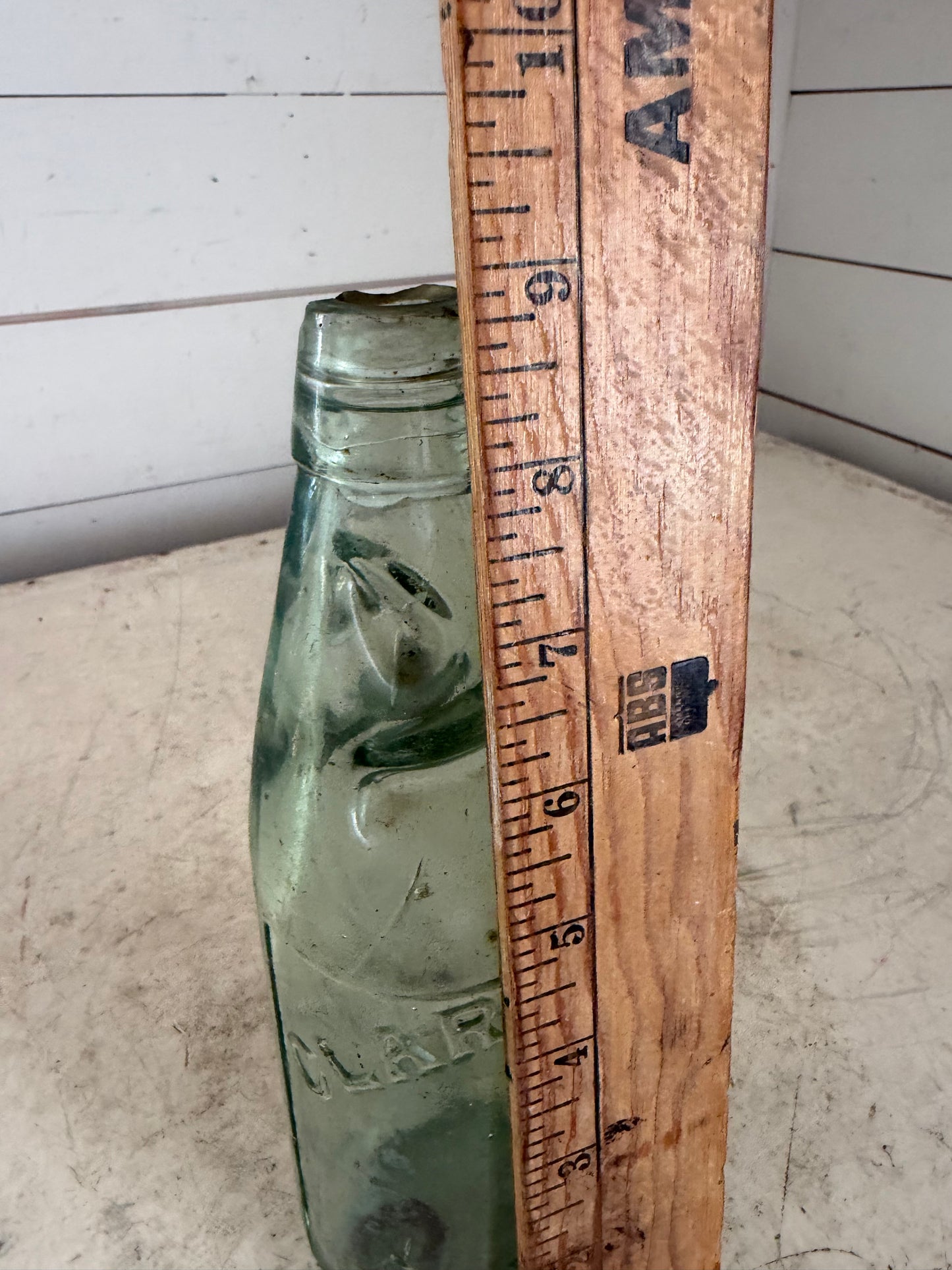 Antique glass Codd soda bottle
