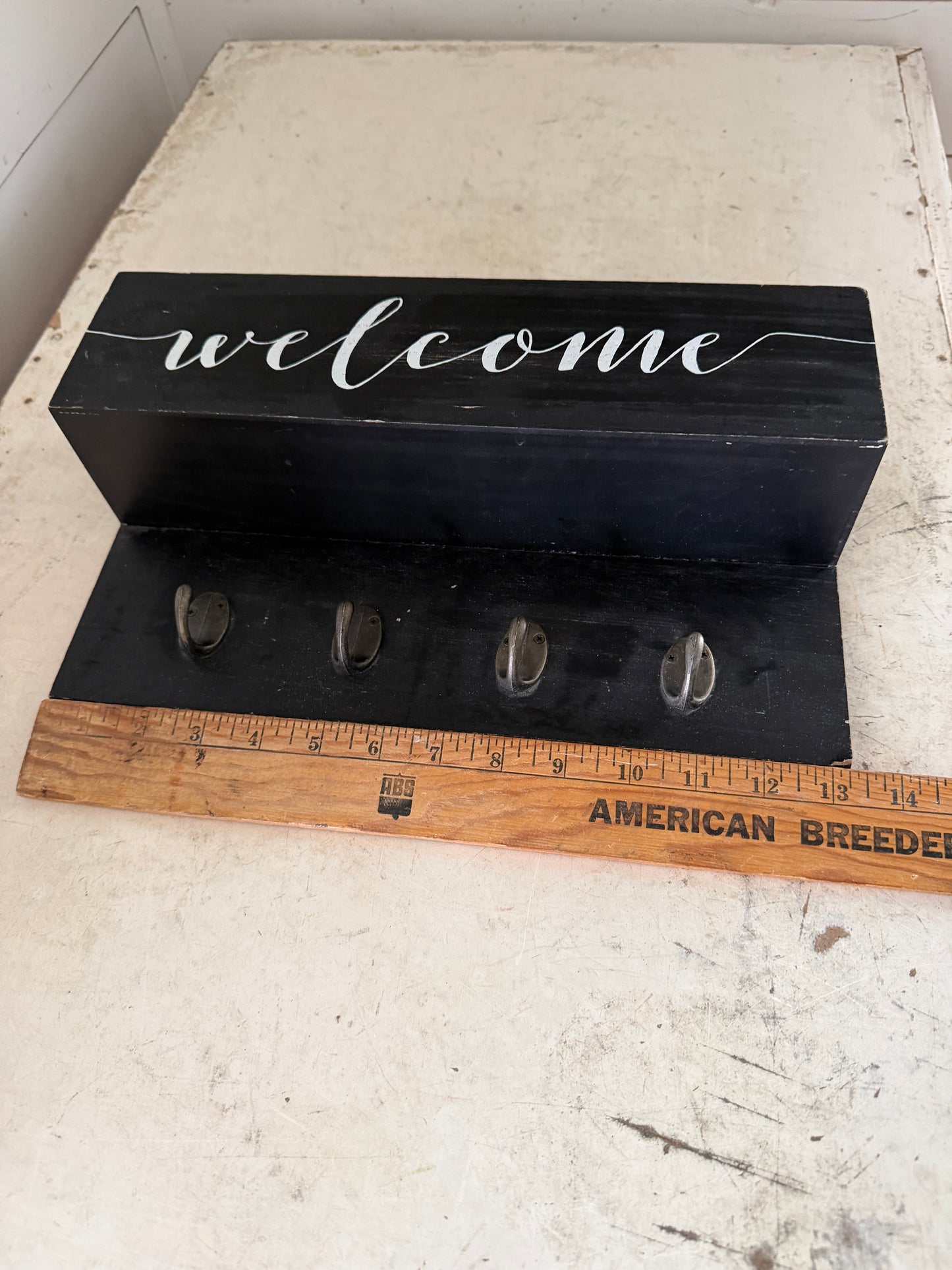 Wall mounted entryway organizer with hooks- will get makeover