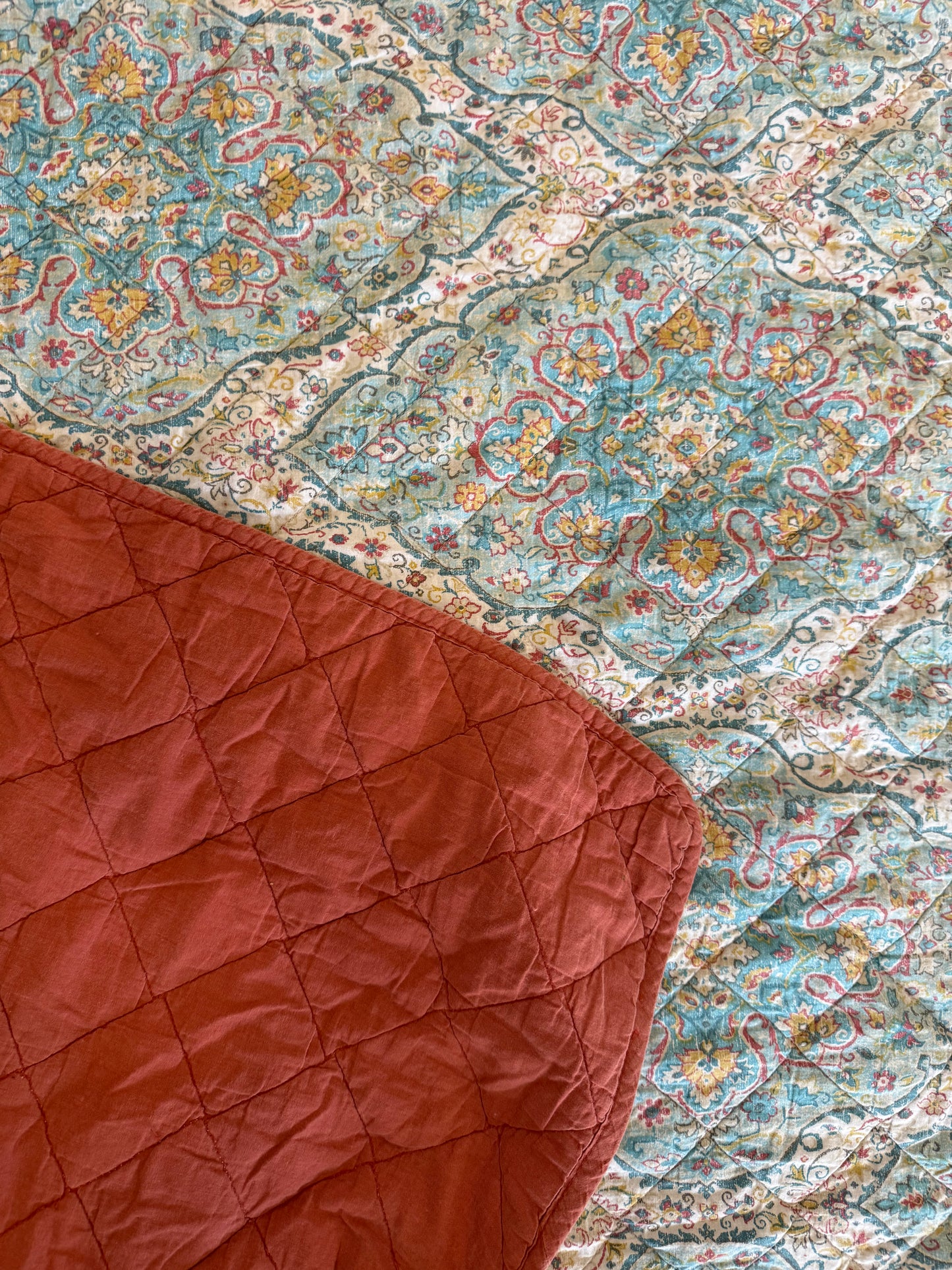 Queen size bohemian turquoise, and coral quilt