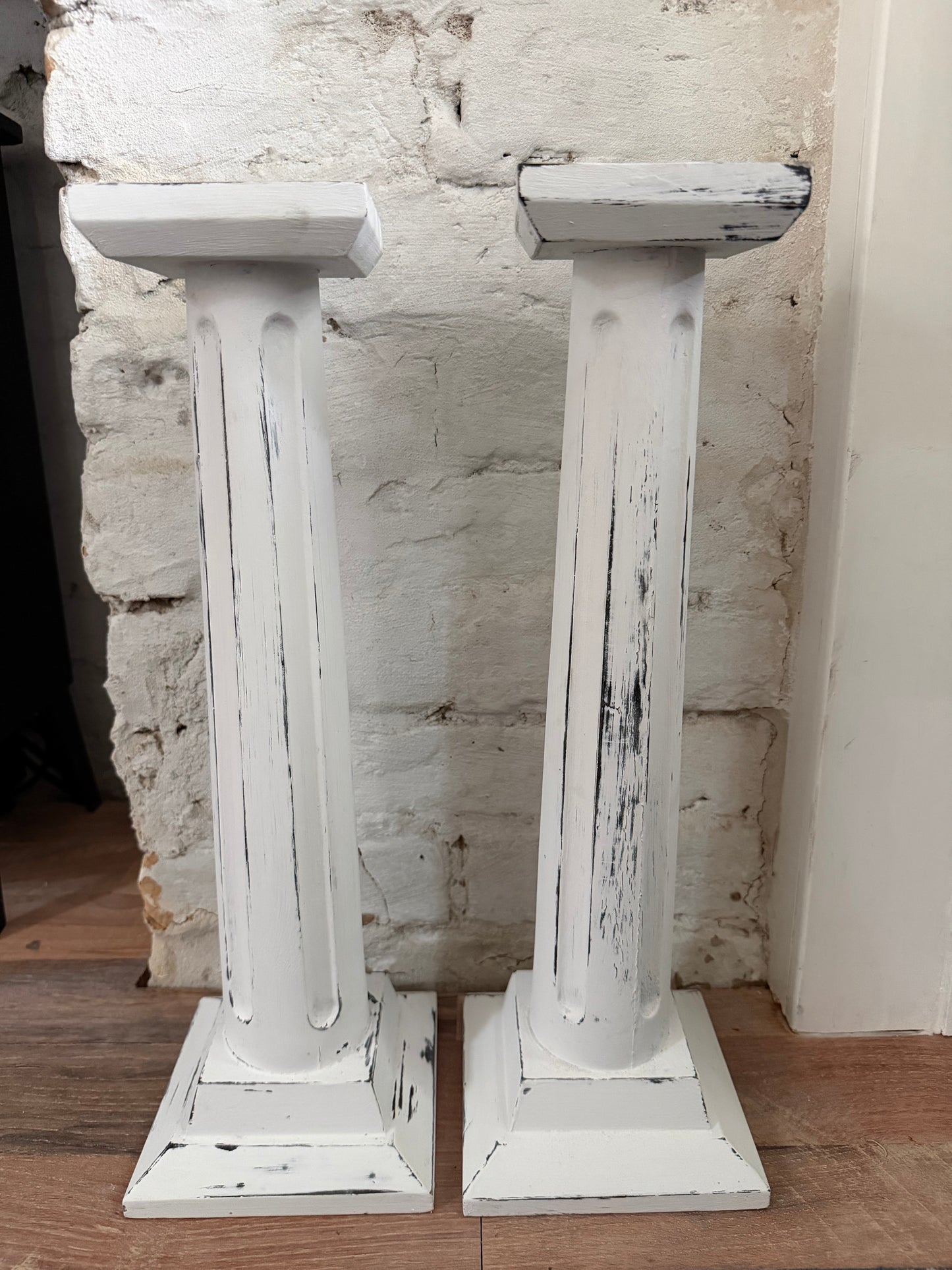 Set of two large hand painted pillar candlesticks 18”