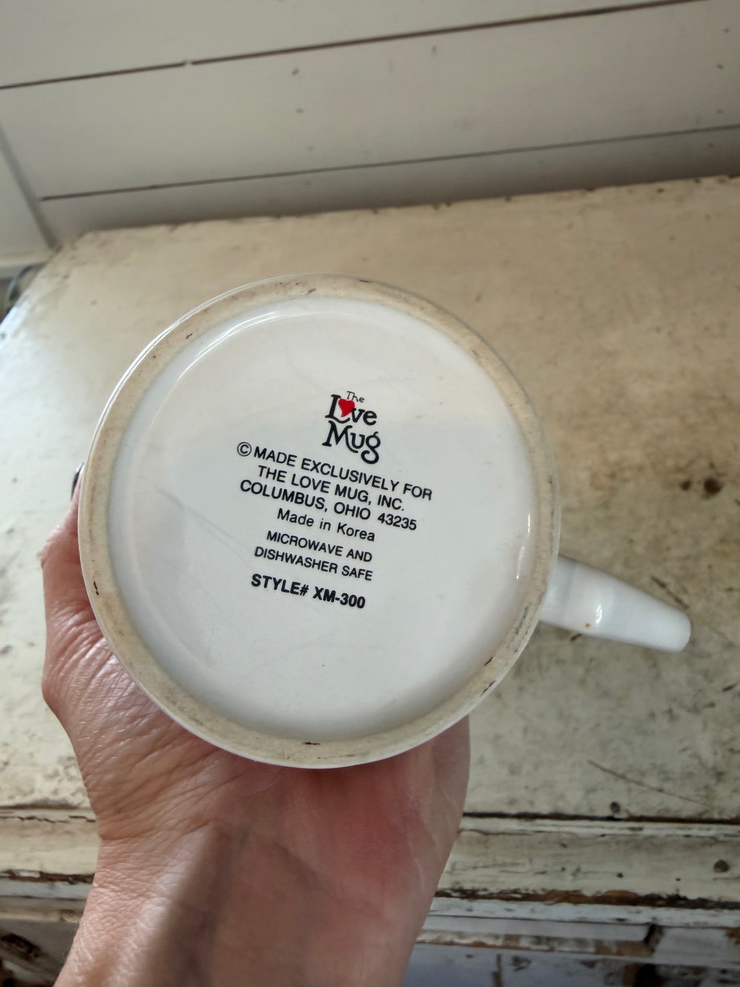 Christmas cup with stocking shaped handle