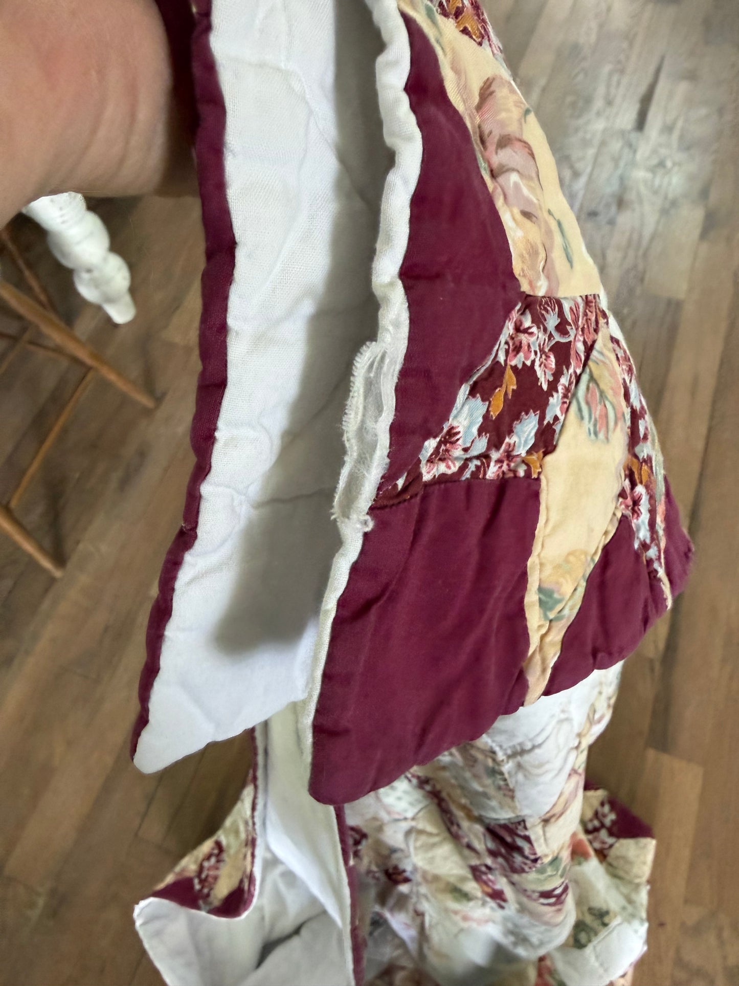 handmade quilt featuring a repeating star pattern full