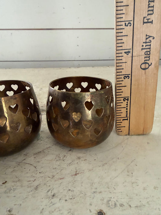 Set of three vintage brass votive candle holder with hearts punched in them