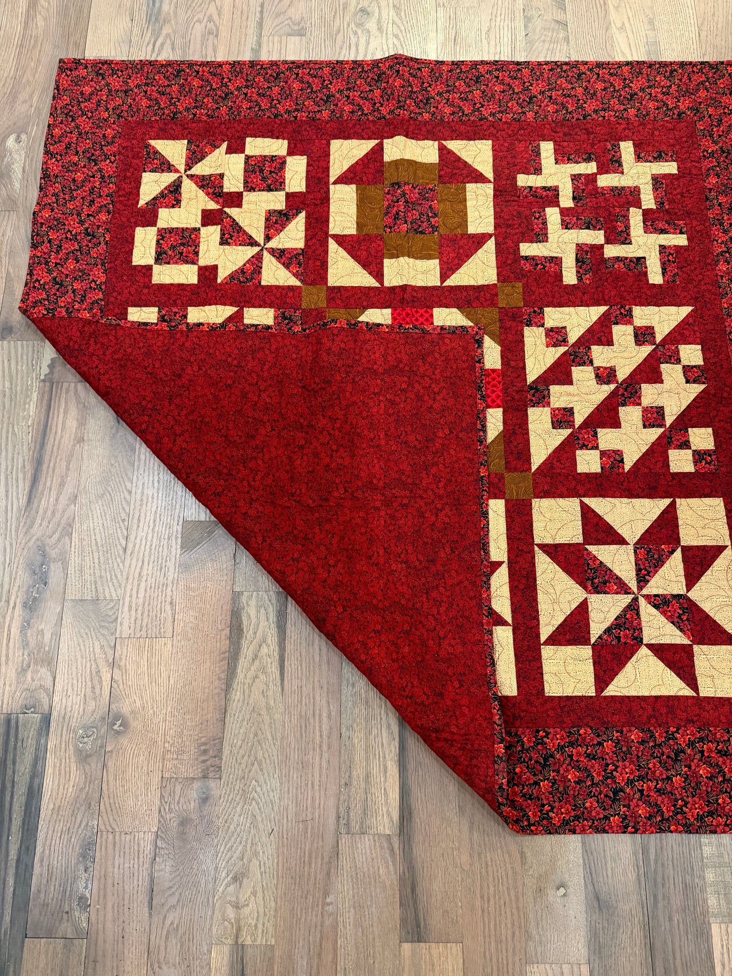 Small red and cream piece quilt throw size