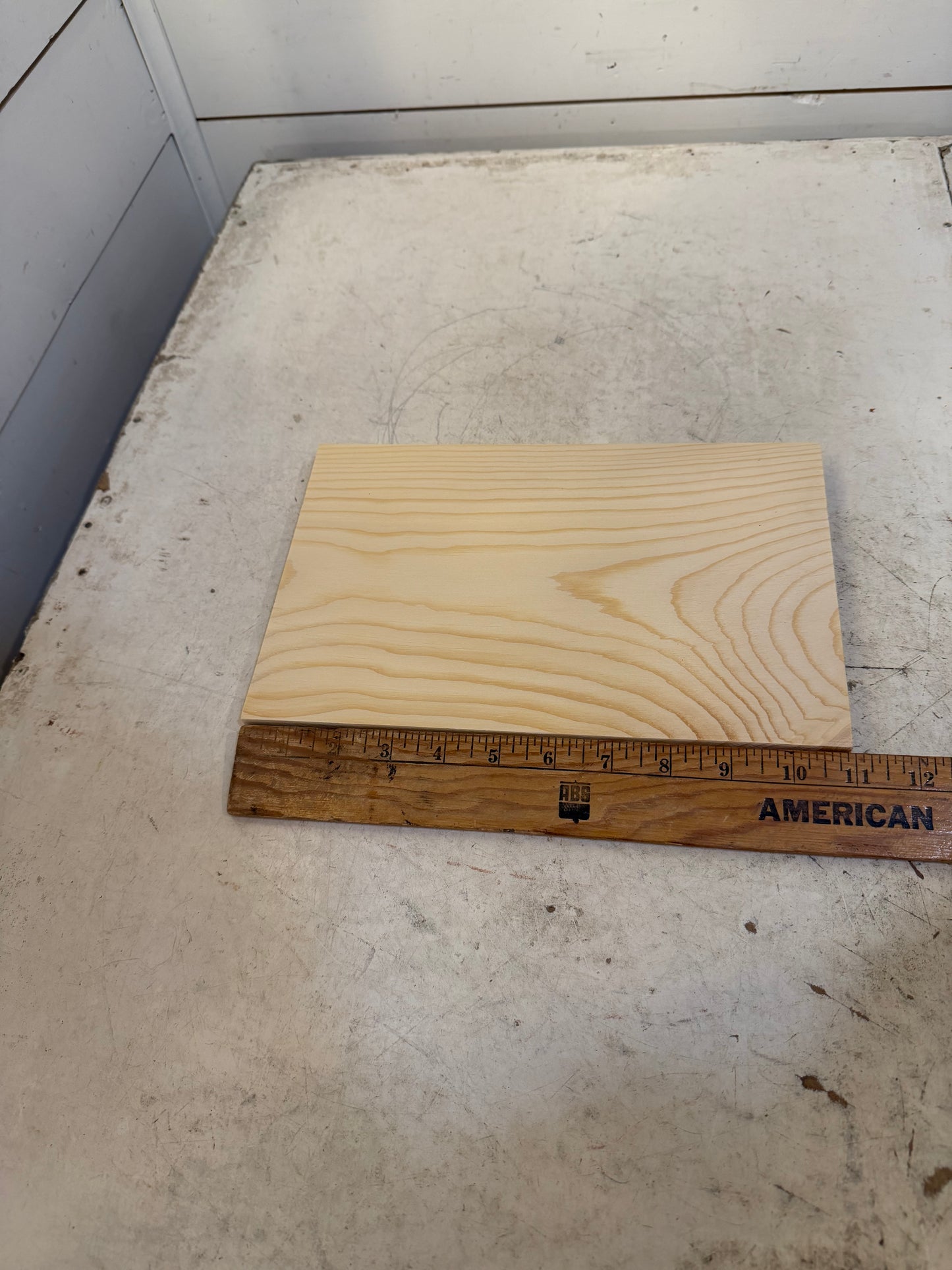 Piece of wood will get makeover and hooks