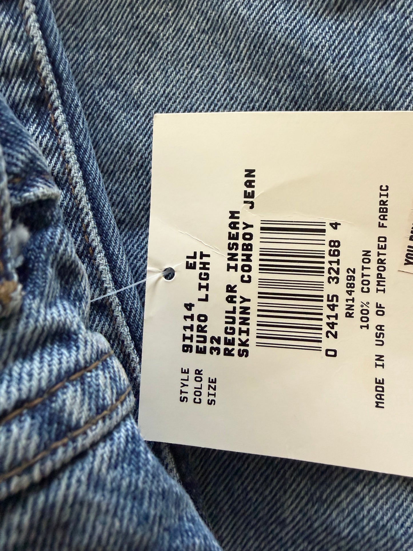 90’s vintage Marithé + François Girbaud denim jeans featuring a black brand hangtag on light-wash material 32 cowboy jean new with tag