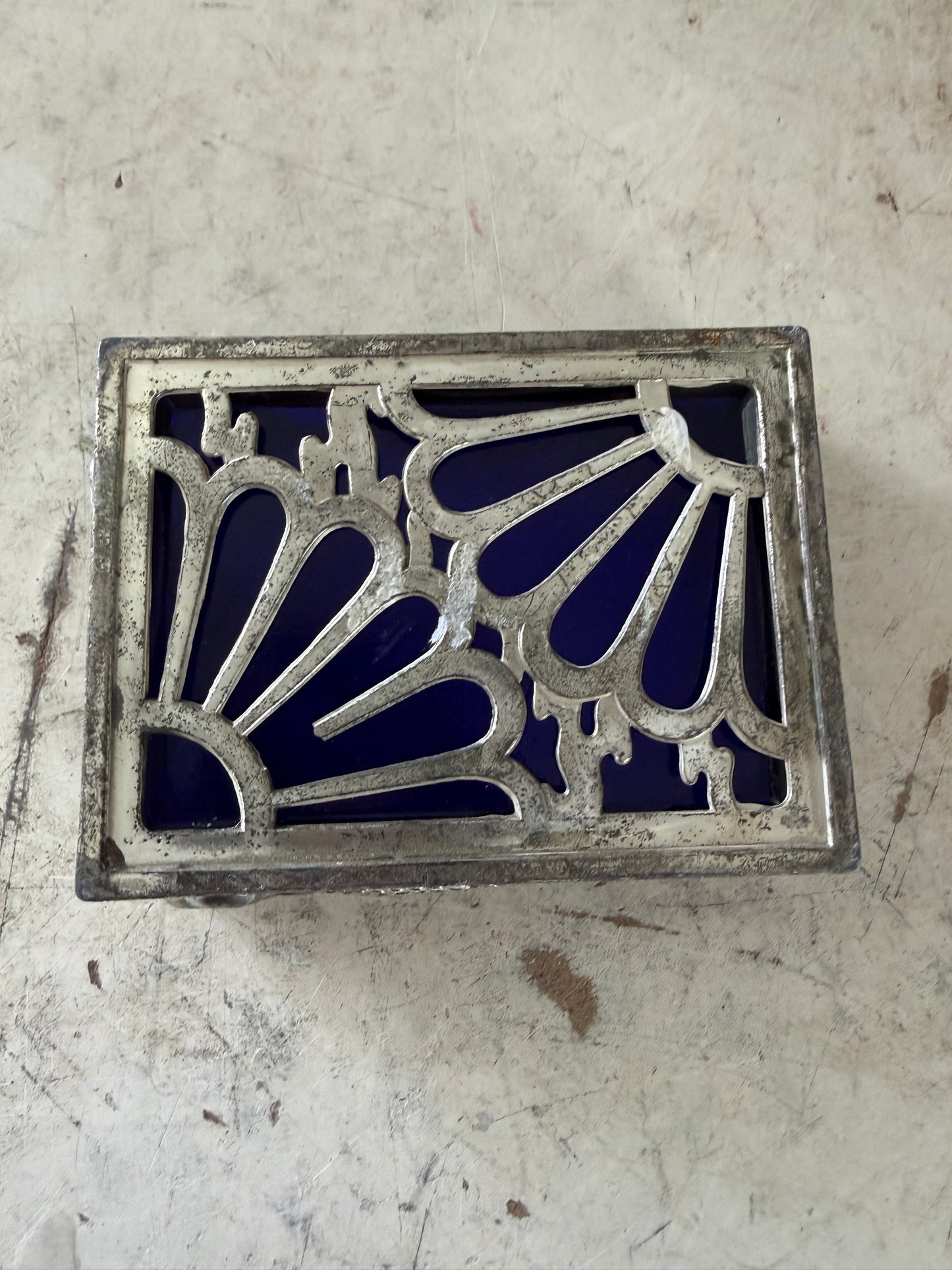 Vintage dragon themed trinket holder with cobalt blue glass insert