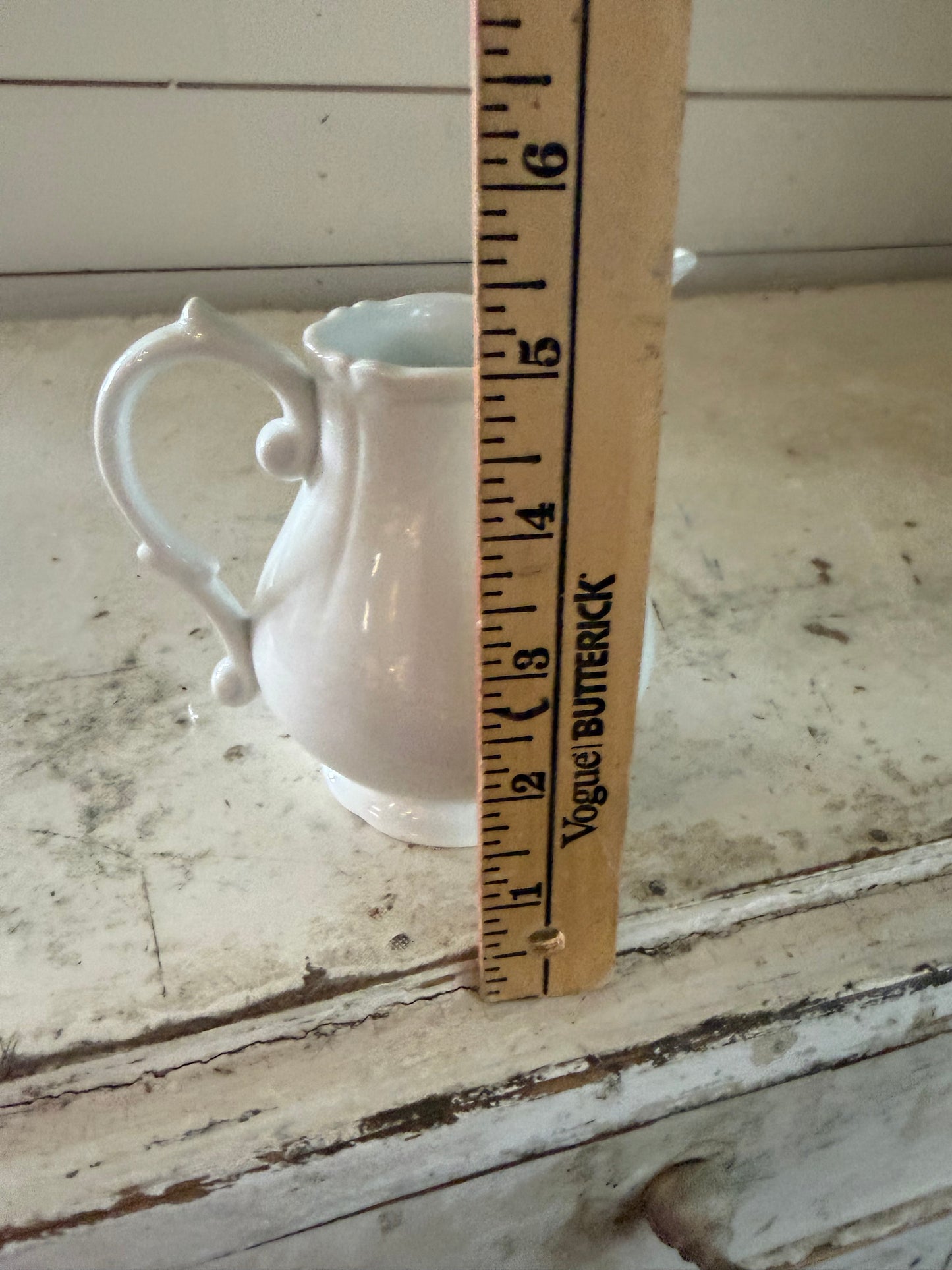 White ceramic creamer