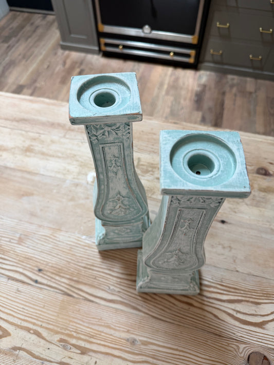 Set of decorative pillar candlesticks