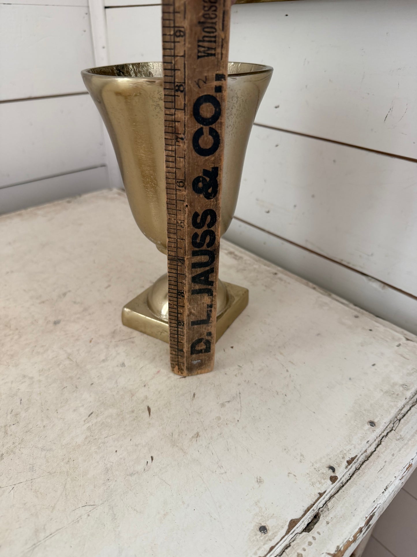 Gold tone urn
