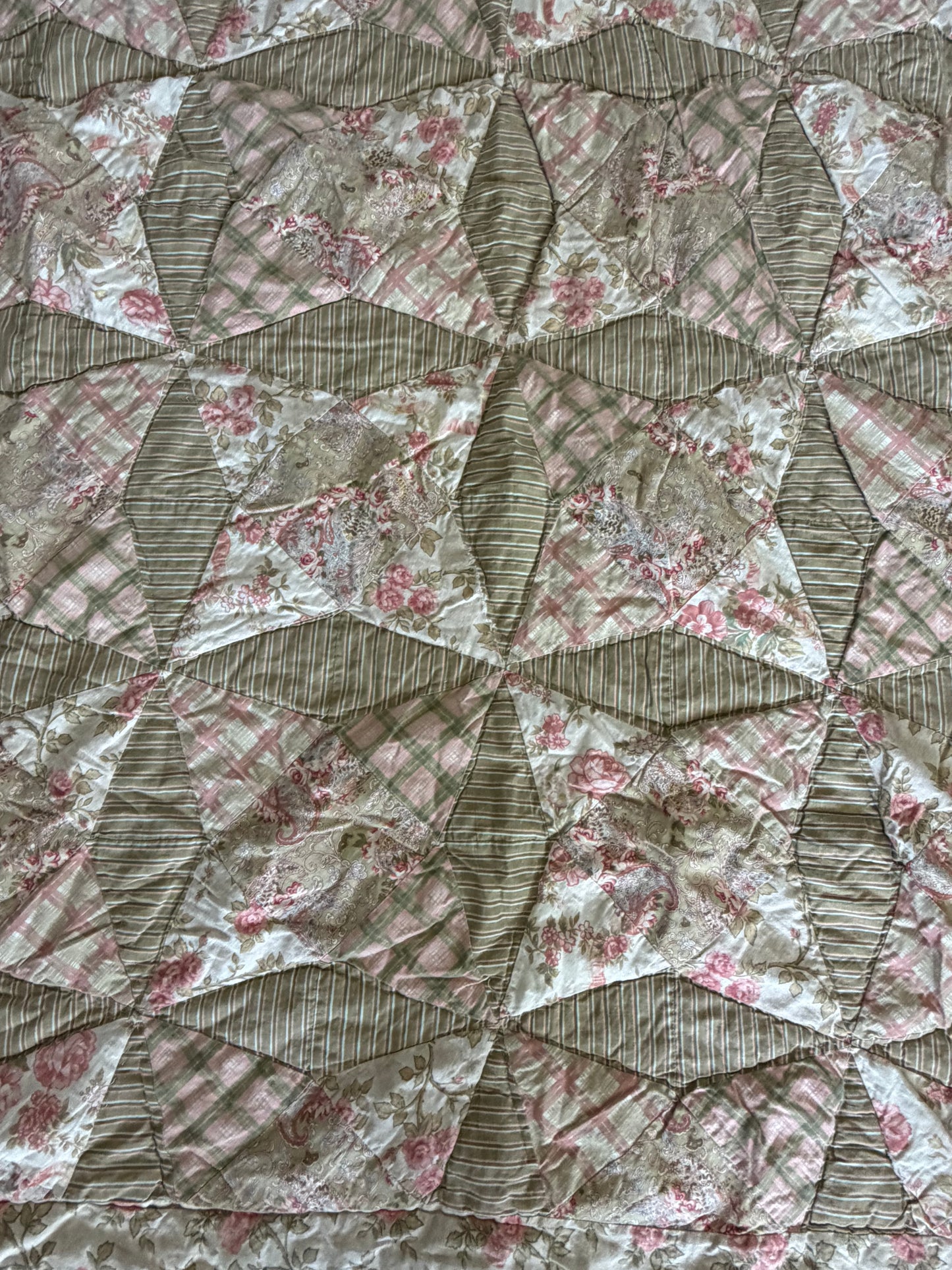 Shabby floral quilt hand stitching, not homemade as is