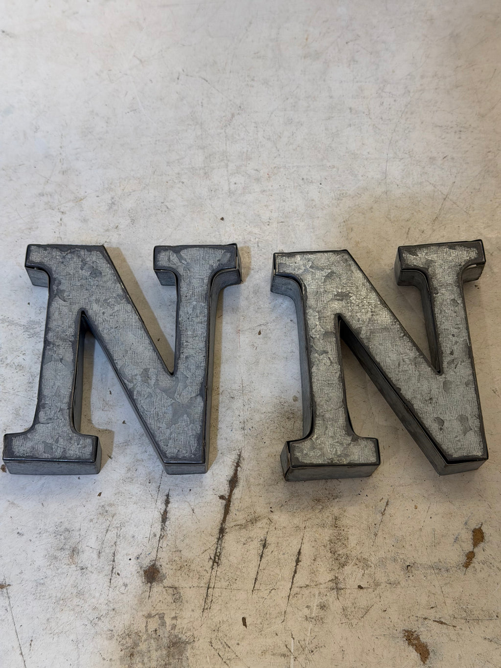 Rustic galvanized, tin letters sold individually Rusted galvanized, tin letters sold individually 3-3/4” - hanging hardware on back