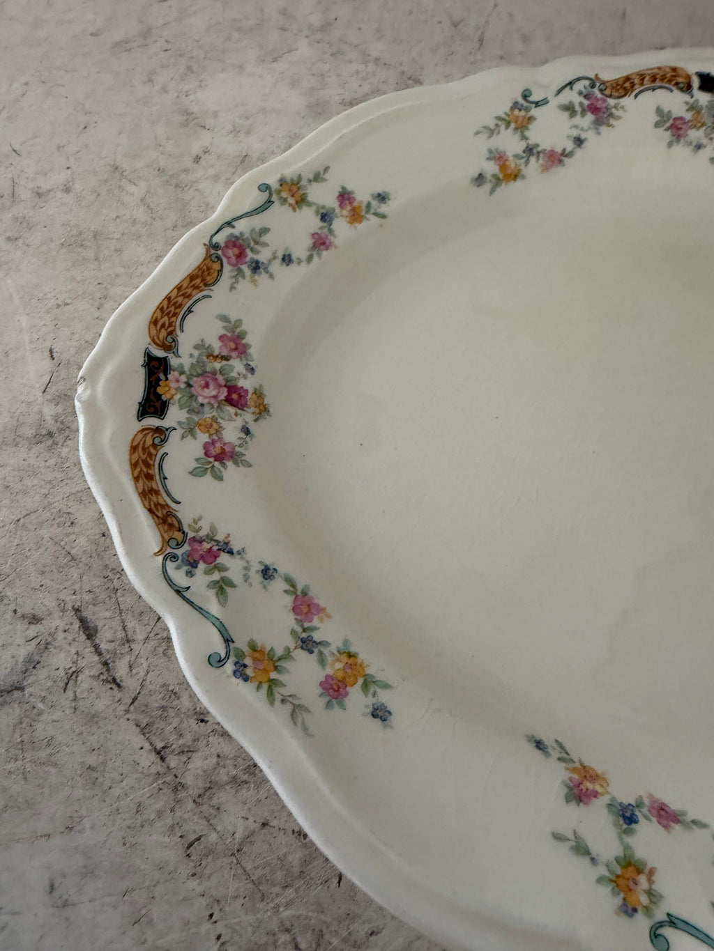 Vintage Edwin M. Knowles China Co Platter has chip