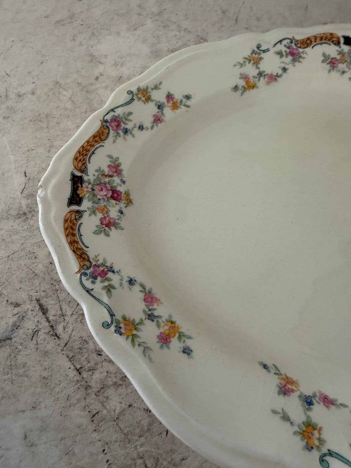 Vintage Edwin M. Knowles China Co Platter has chip