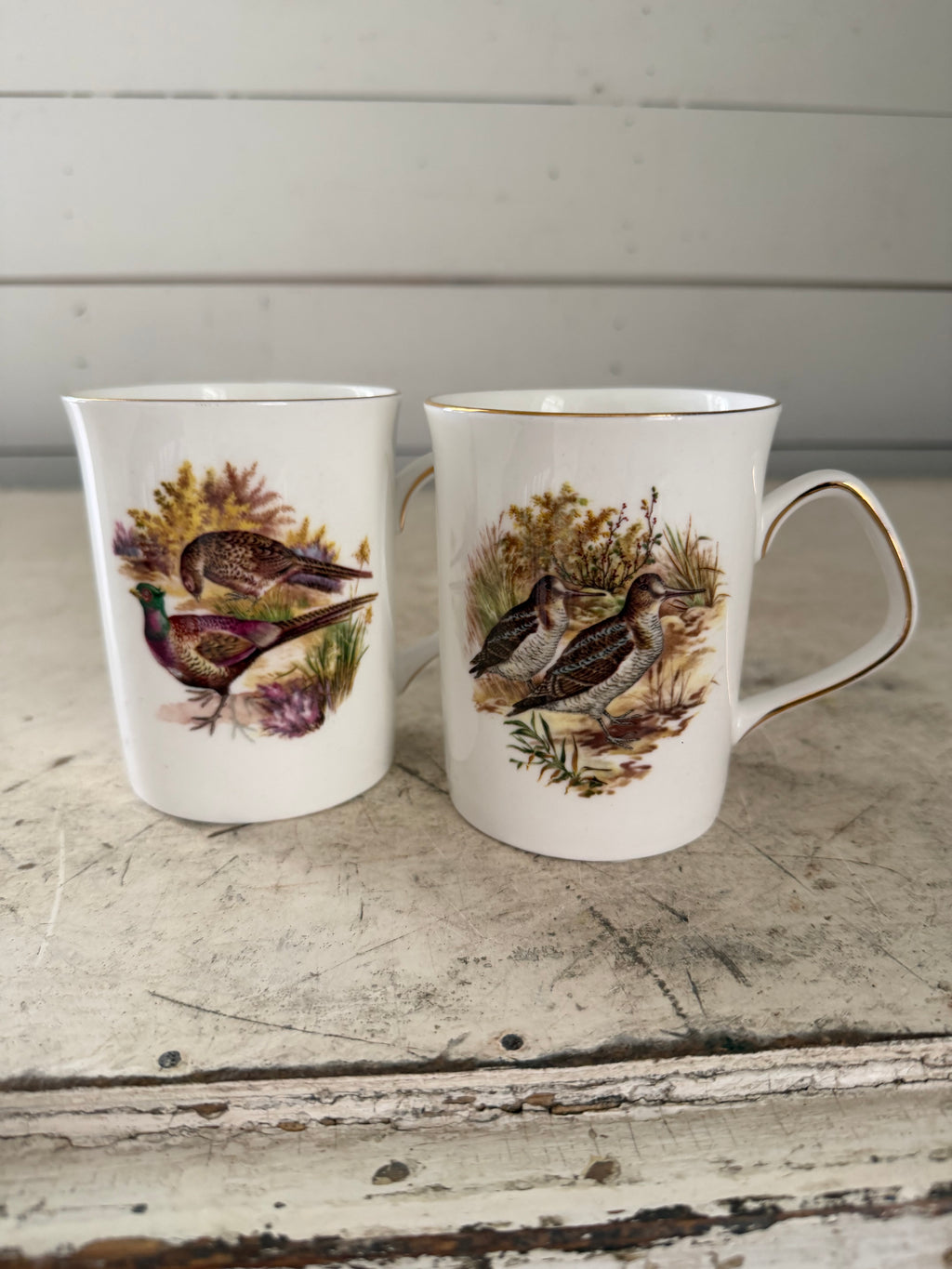 Set of bone China bird mugs