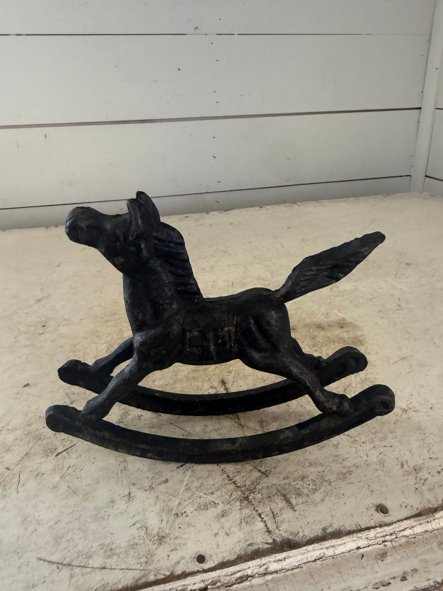 ANTIQUE CAST IRON ROCKING HORSE TOY