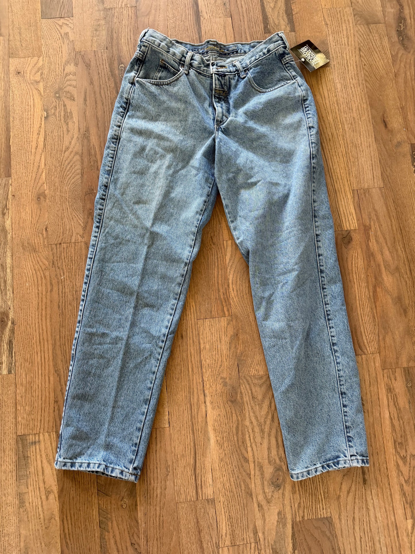 90’s vintage Marithé + François Girbaud denim jeans featuring a black brand hangtag on light-wash material 32 cowboy jean new with tag