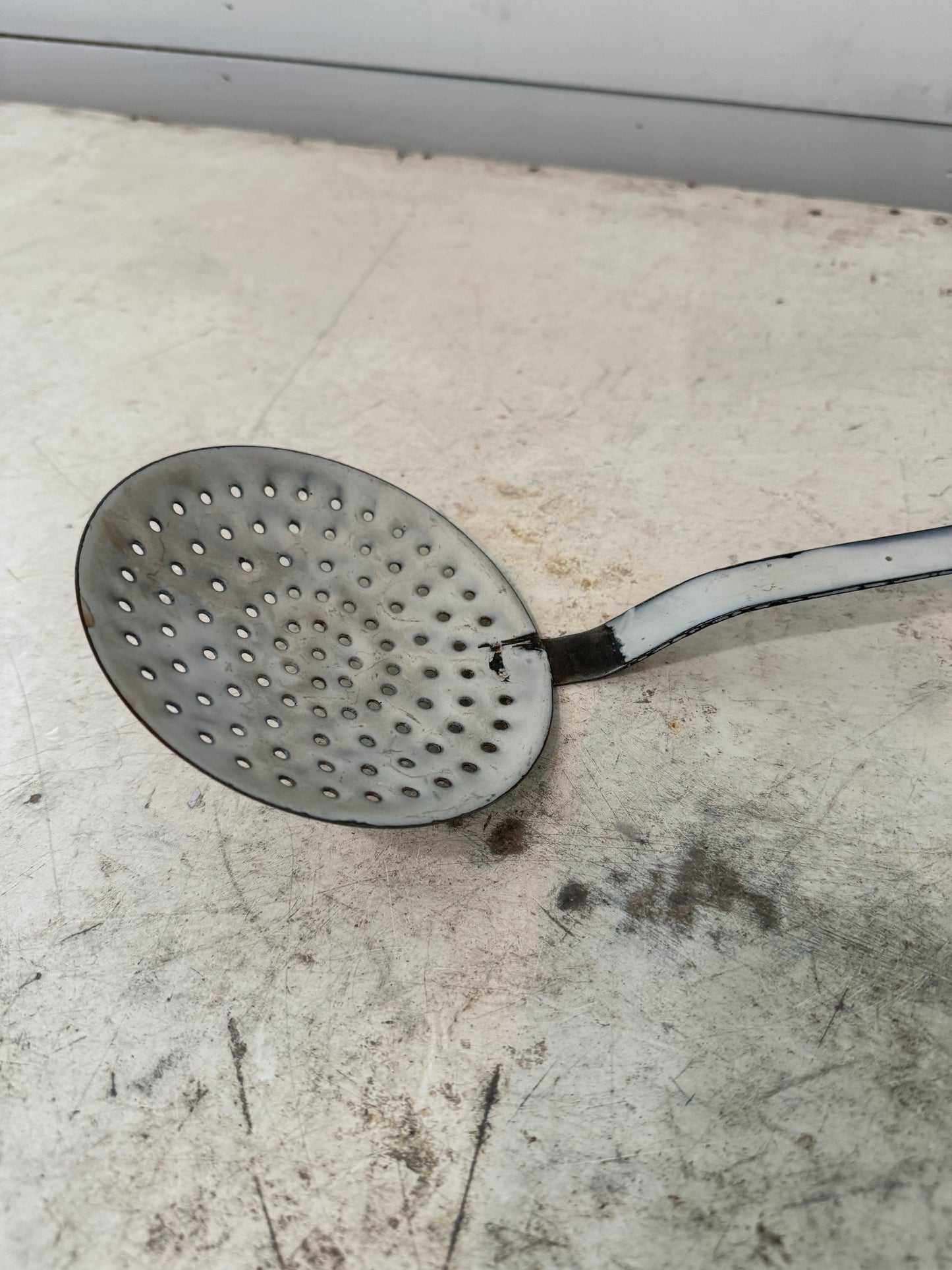 French Vintage white enamelware skimmer strainer utensil