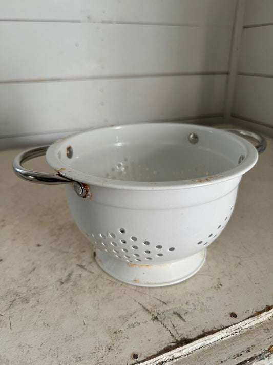 White colander a little rust