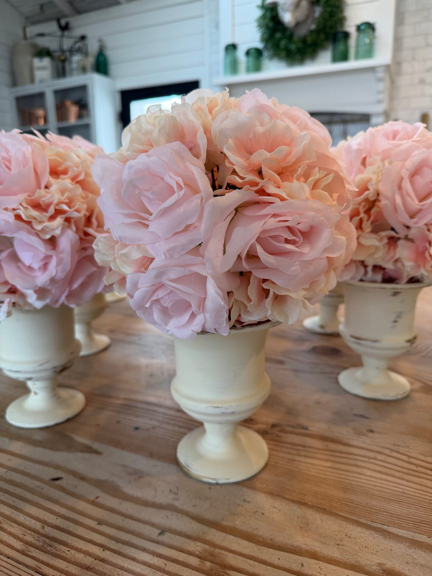 Hand-painted urn with pink flowers included sold individually