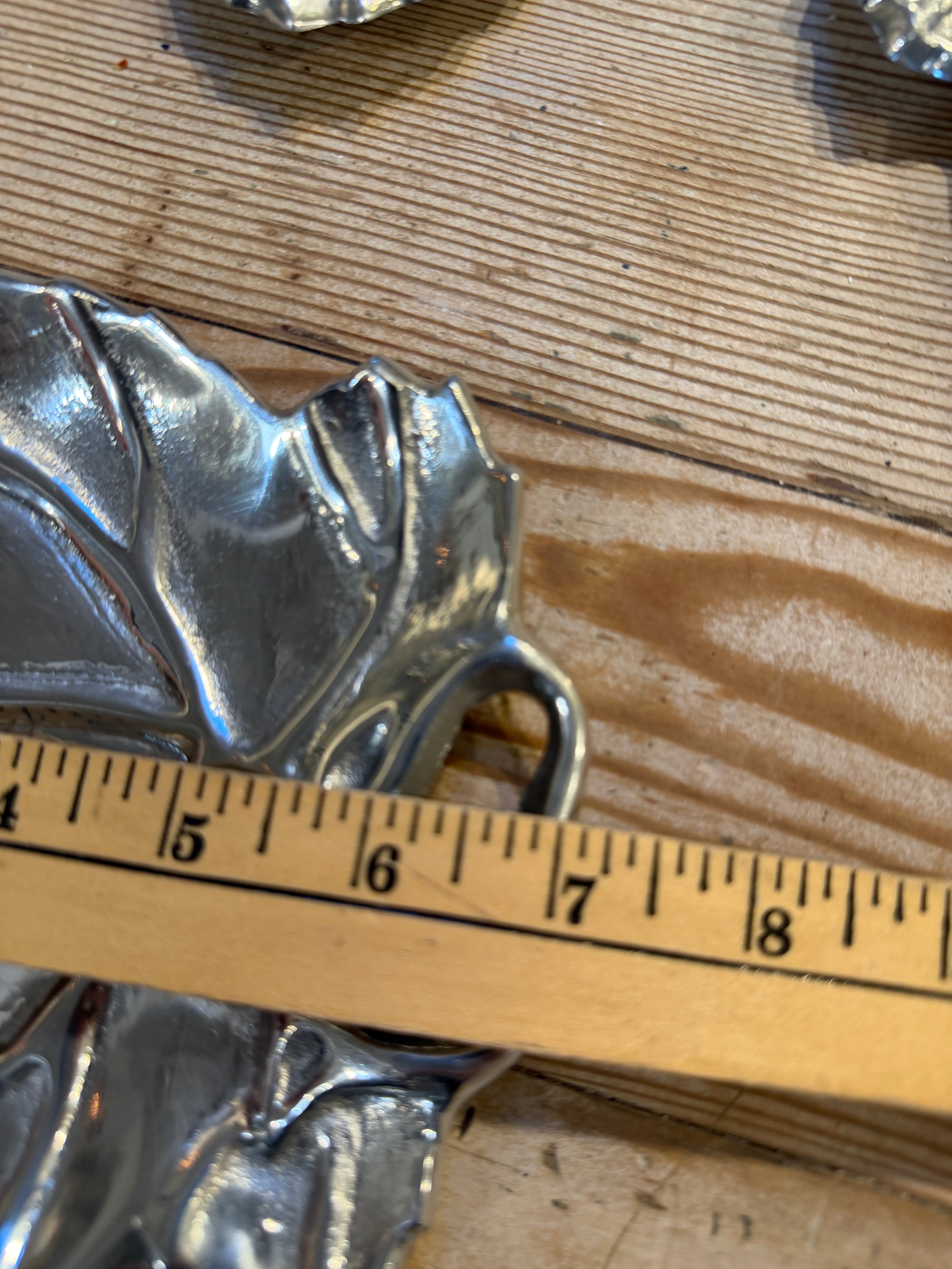 silver-toned leaf trays sold individually