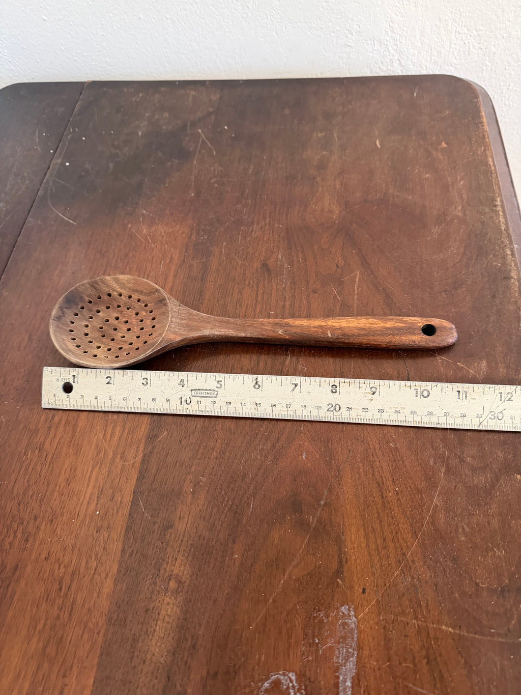 Wooden slotted spoon