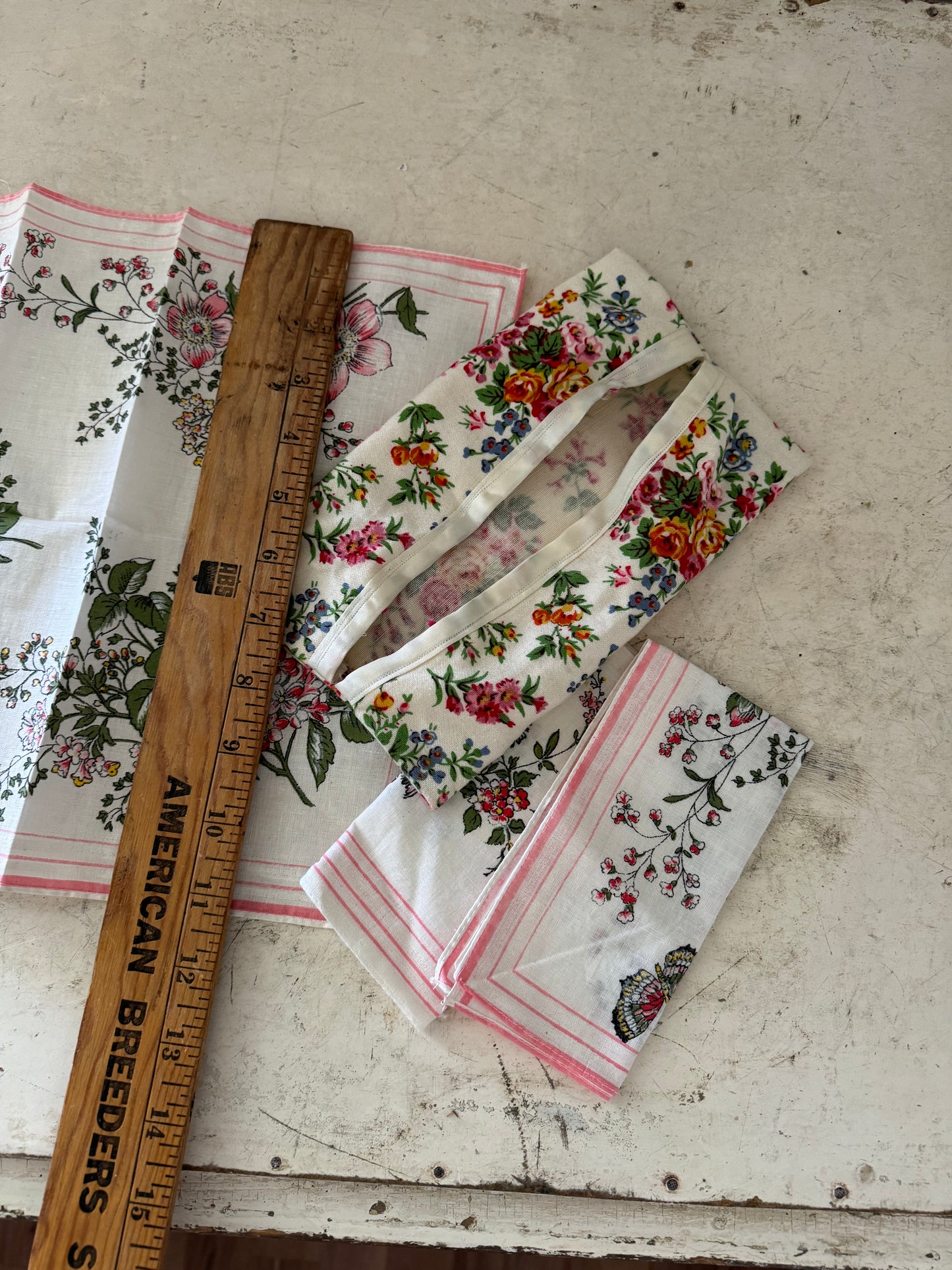 Set of three floral handkerchiefs and holder