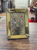 Small brass frame will get art sold individually
