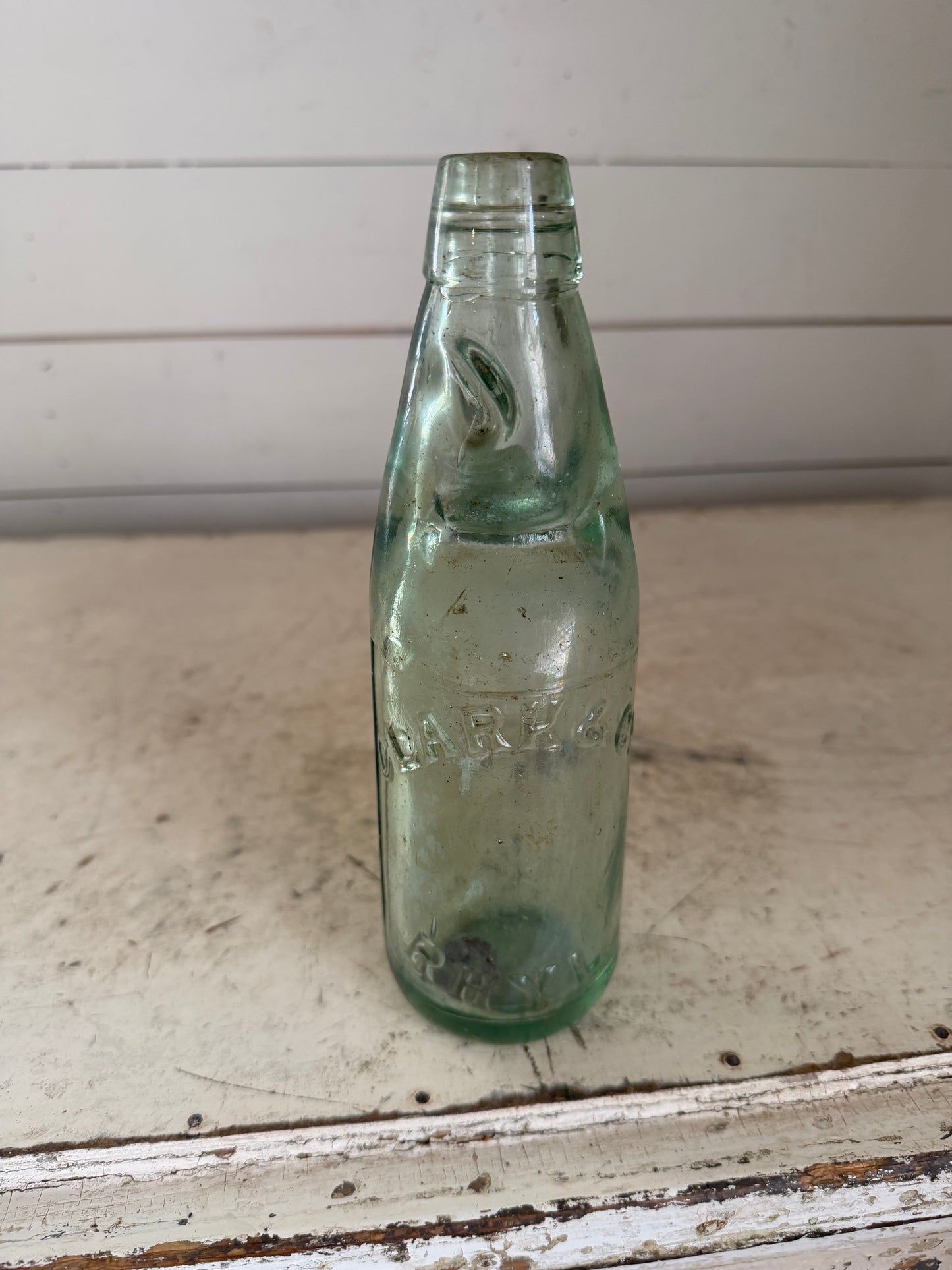 Antique glass Codd soda bottle