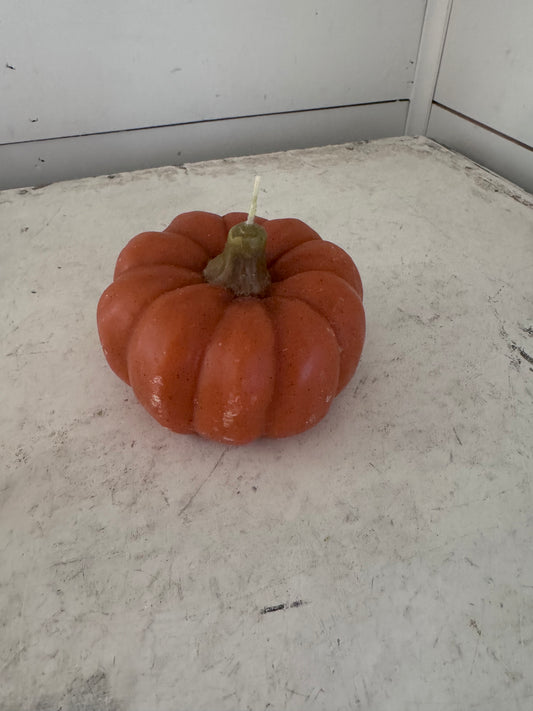 Pumpkin shaped candle