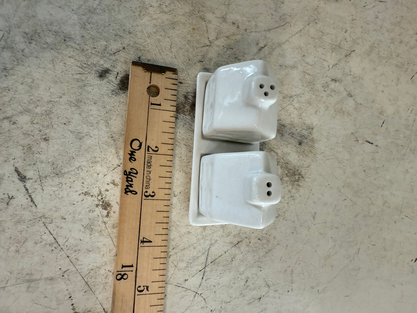 White ceramic House salt and pepper shakers