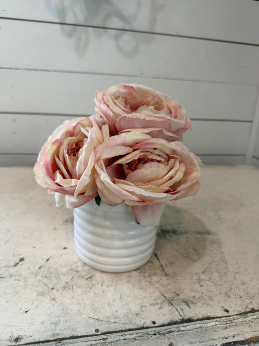 White porcelain pot with pink roses
