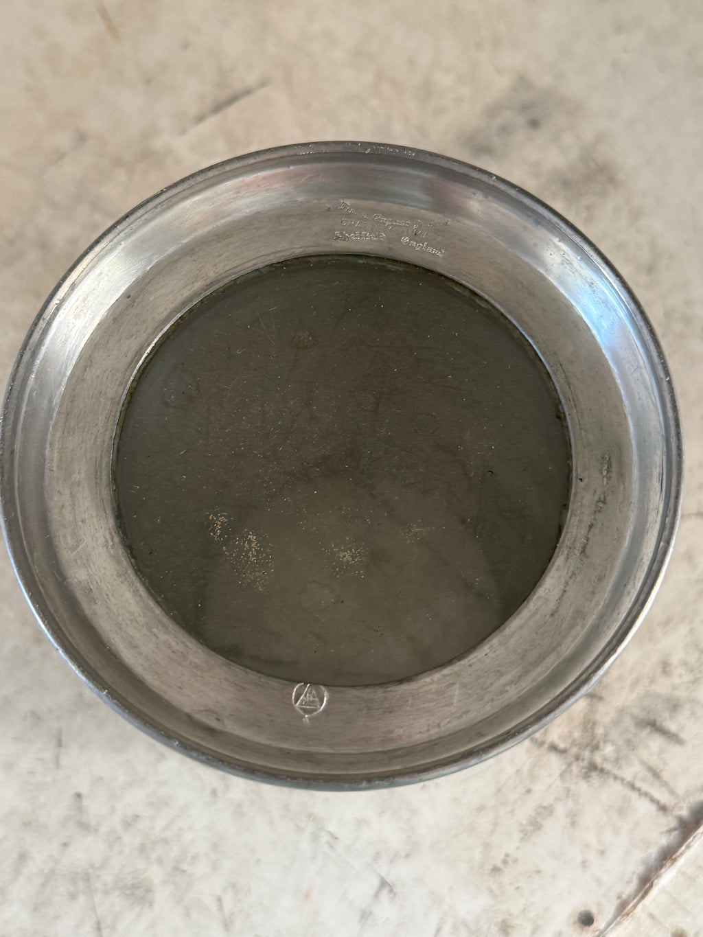 Engraved English pewter tankered with glass bottom
