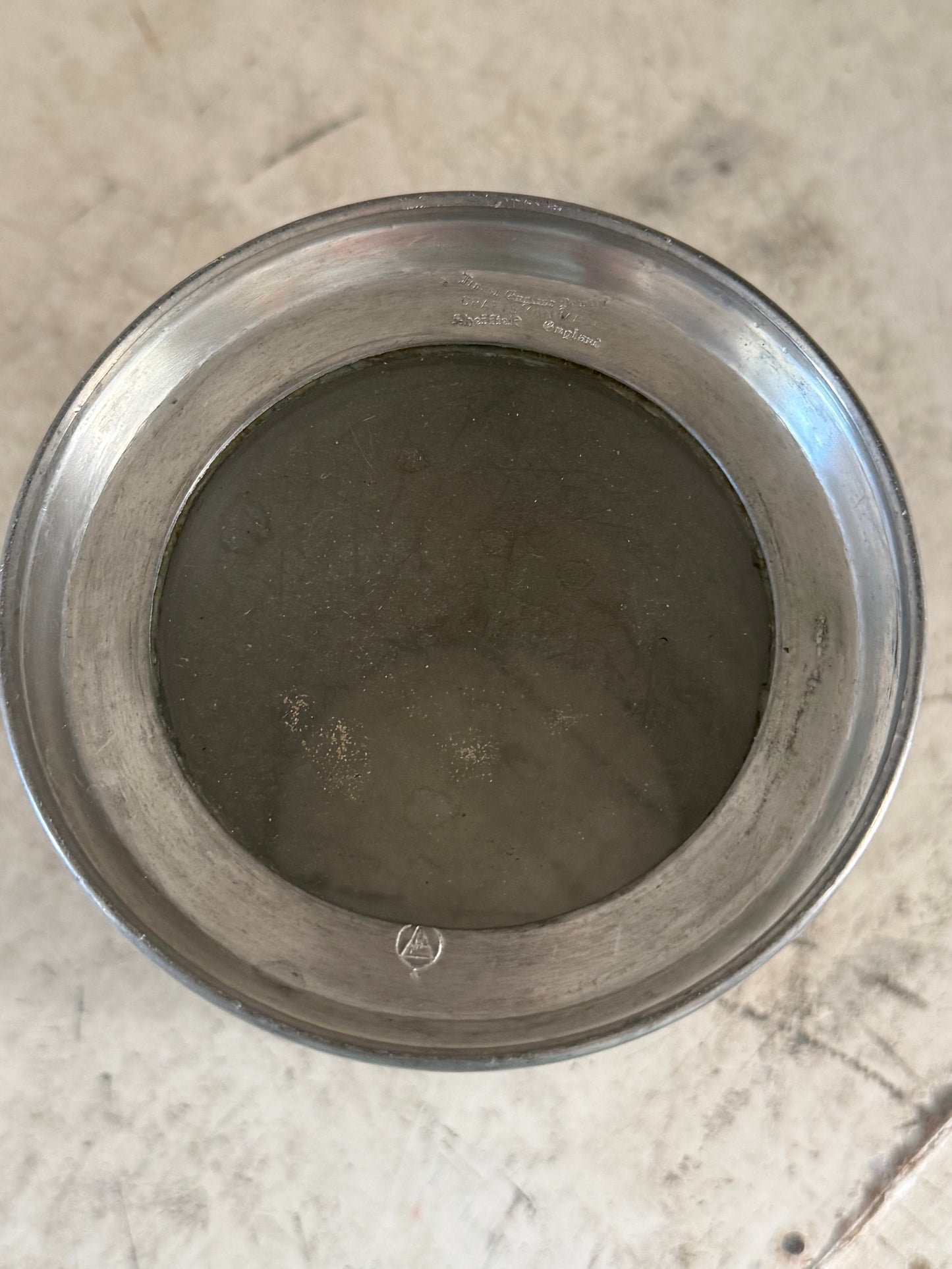 Engraved English pewter tankered with glass bottom