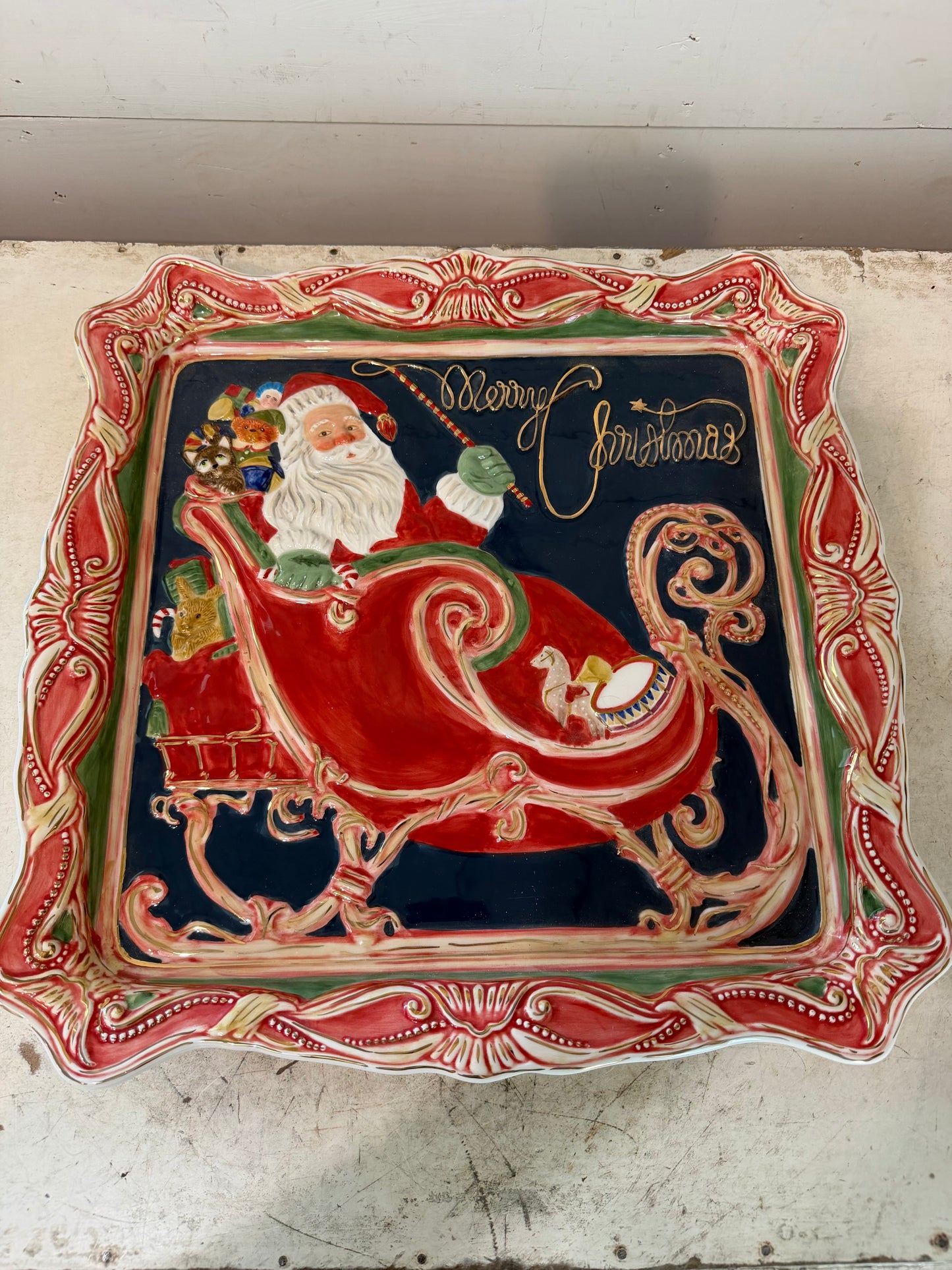 Department 56 ceramic platter, hand-painted Santa Claus riding in a sleigh with a bag of toys