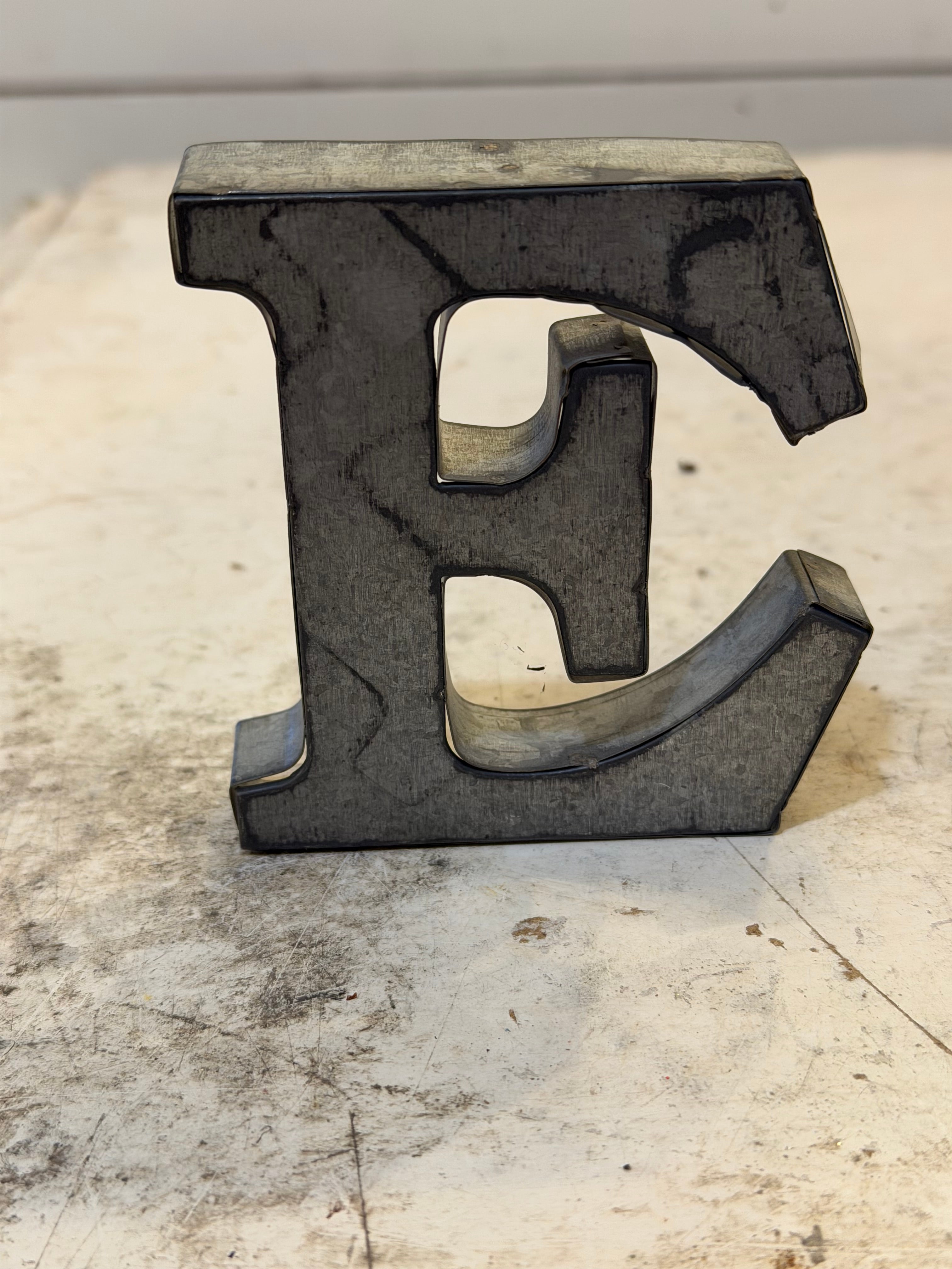 Rustic galvanized, tin letters sold individually Rusted galvanized, tin letters sold individually 3-3/4” - hanging hardware on back