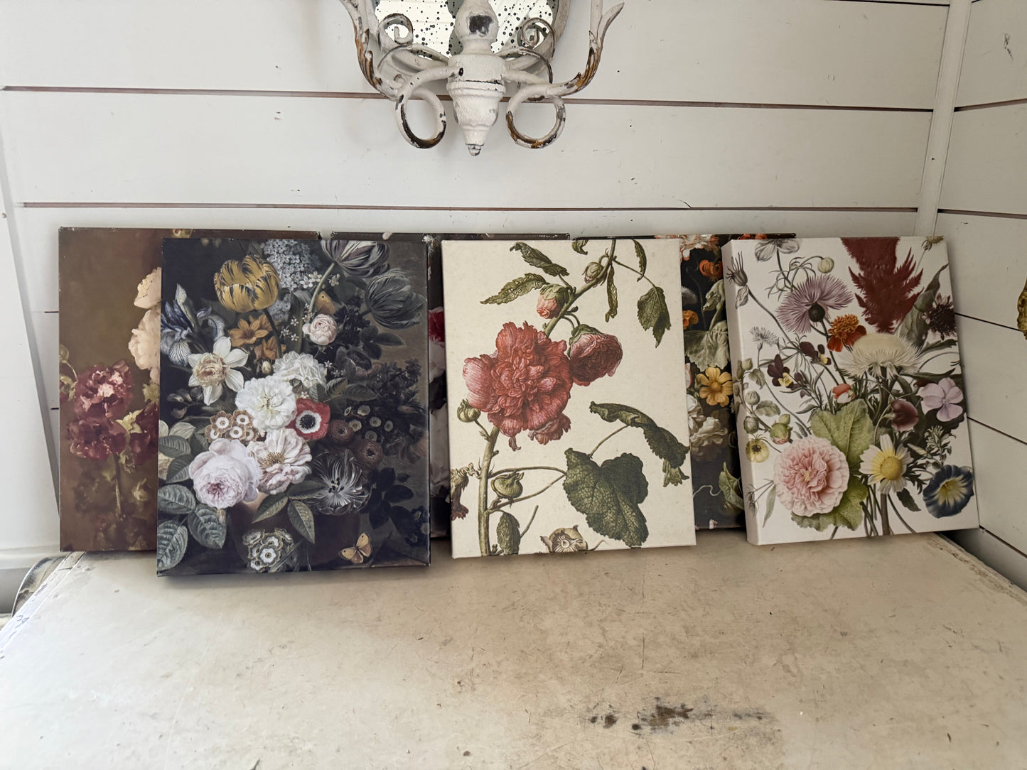 Canvas floral art sold individually will get wood framed with salvage wood