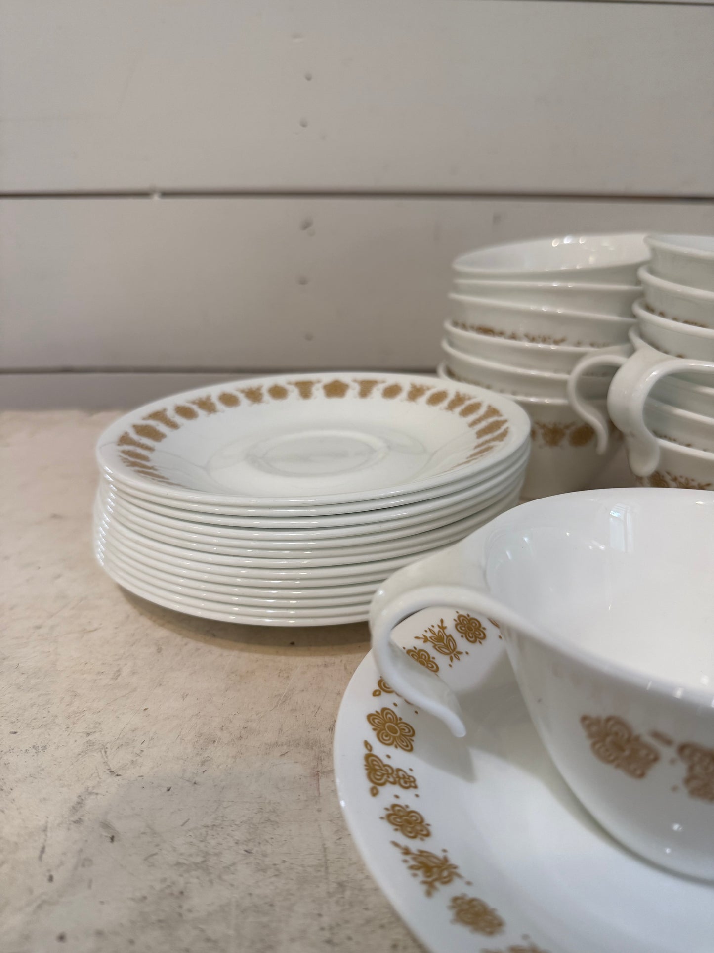 Corelle "Butterfly Gold" teacup and saucer and plates sold individually