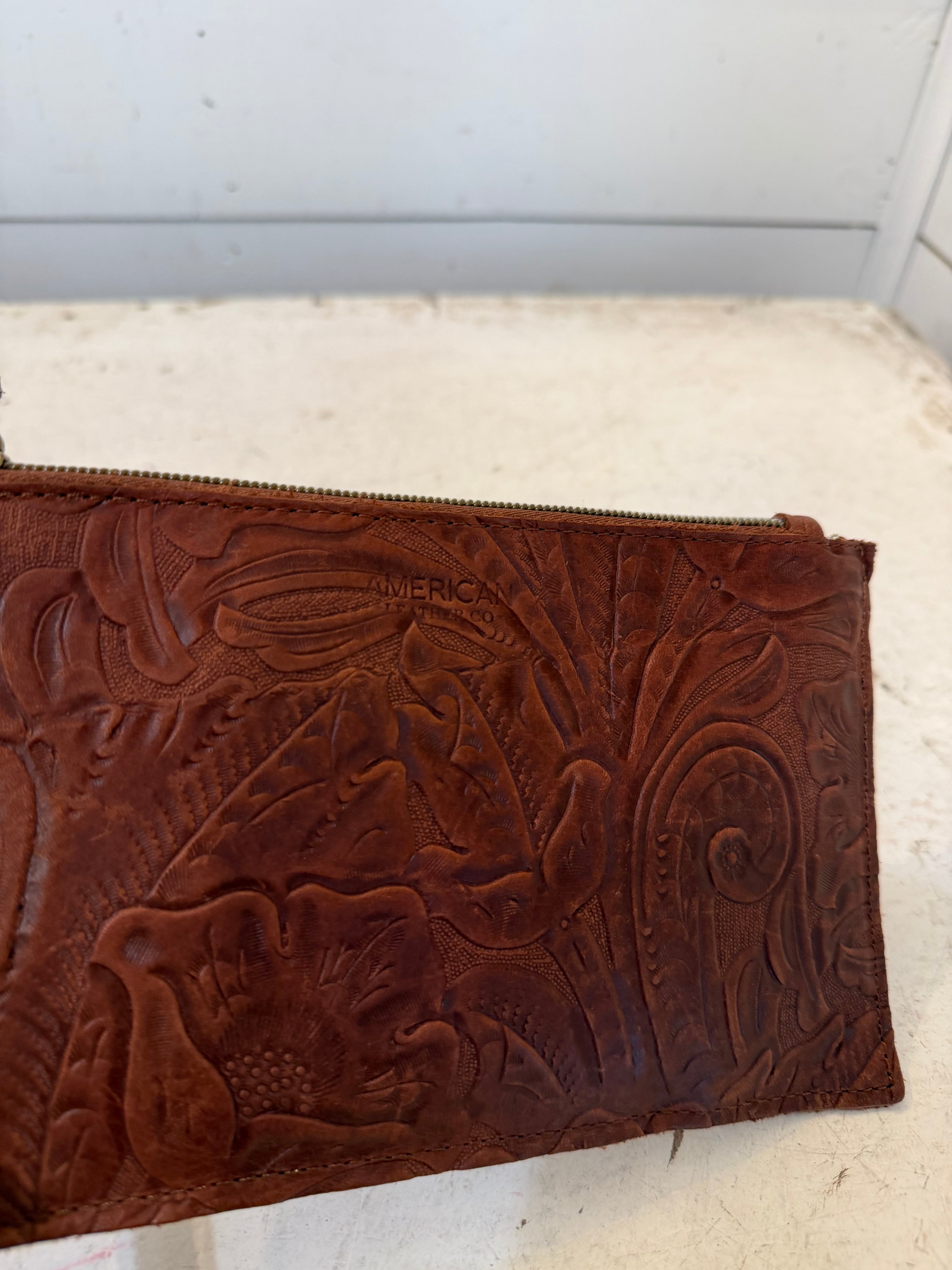 American Leather Co Leather floral embossed essential power wristlet