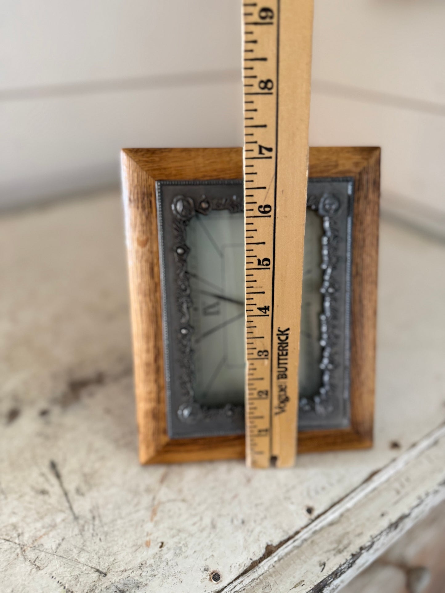 Wood and rose wood framed clock