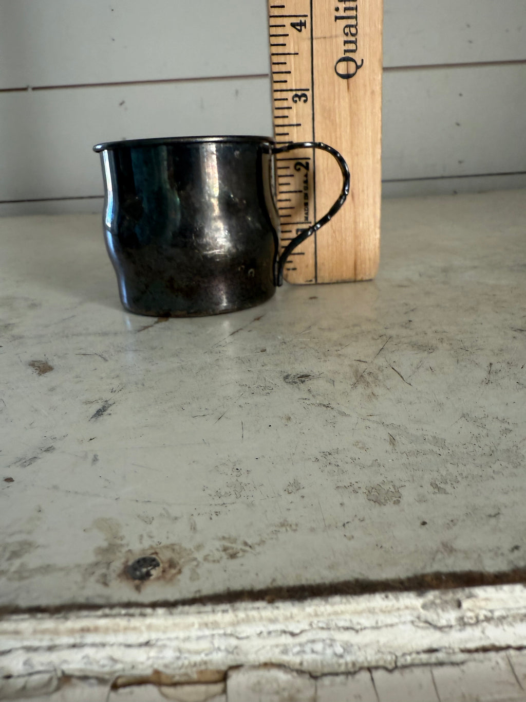 Silver plated baby cup made by community