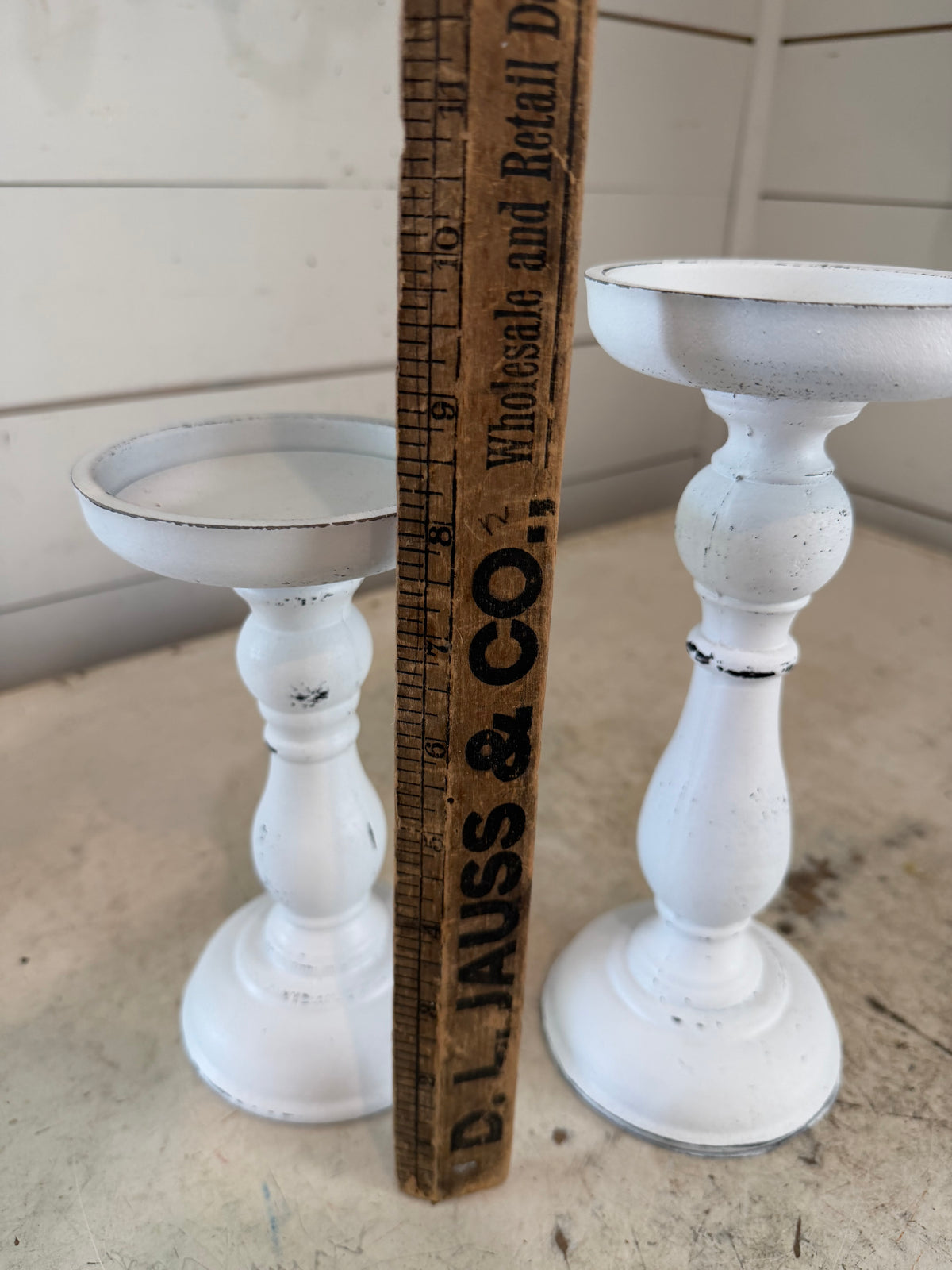 Set of white chippy candlesticks