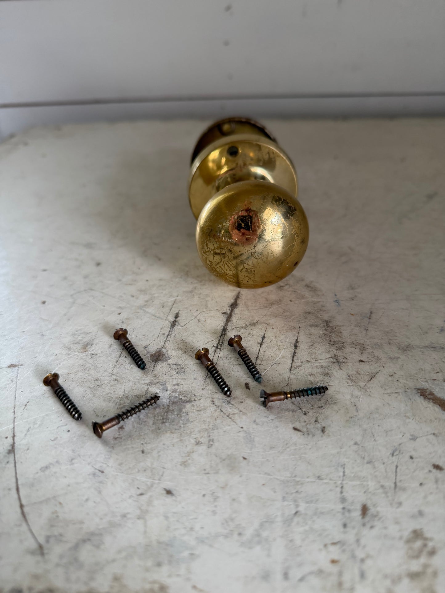 Edwardian Style Solid Brass doorknob with brass screws - one knob is round one is oval